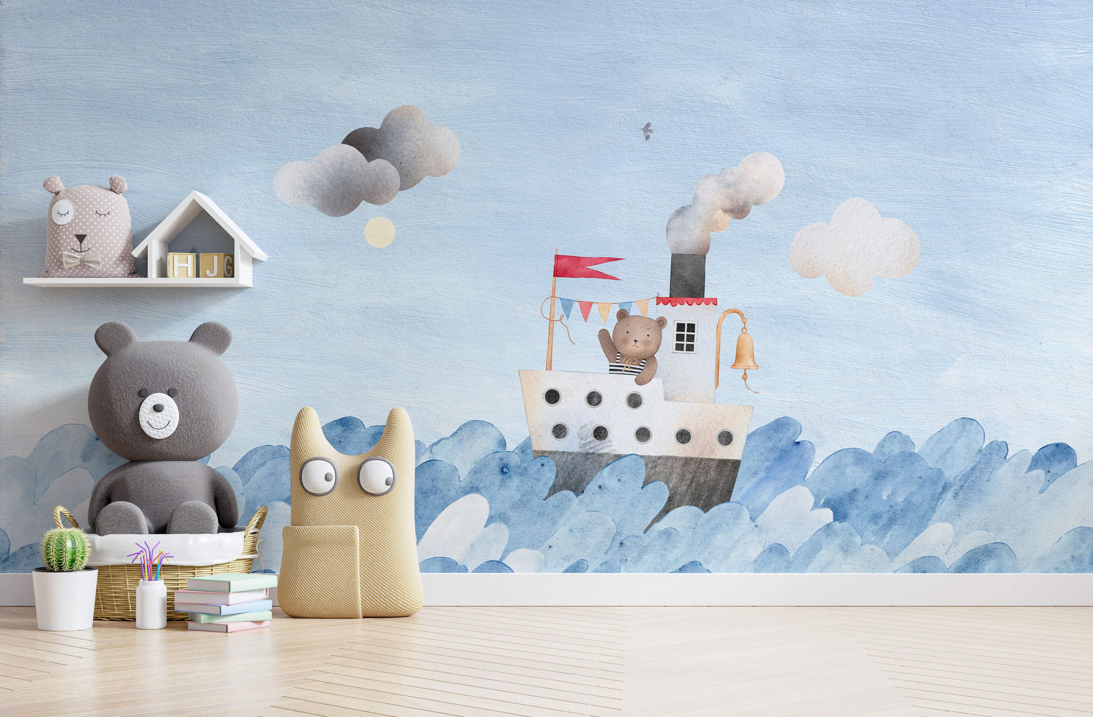 Watercolor mural depicting a friendly bear sailing a steamboat on blue illustrated waves beneath soft clouds.