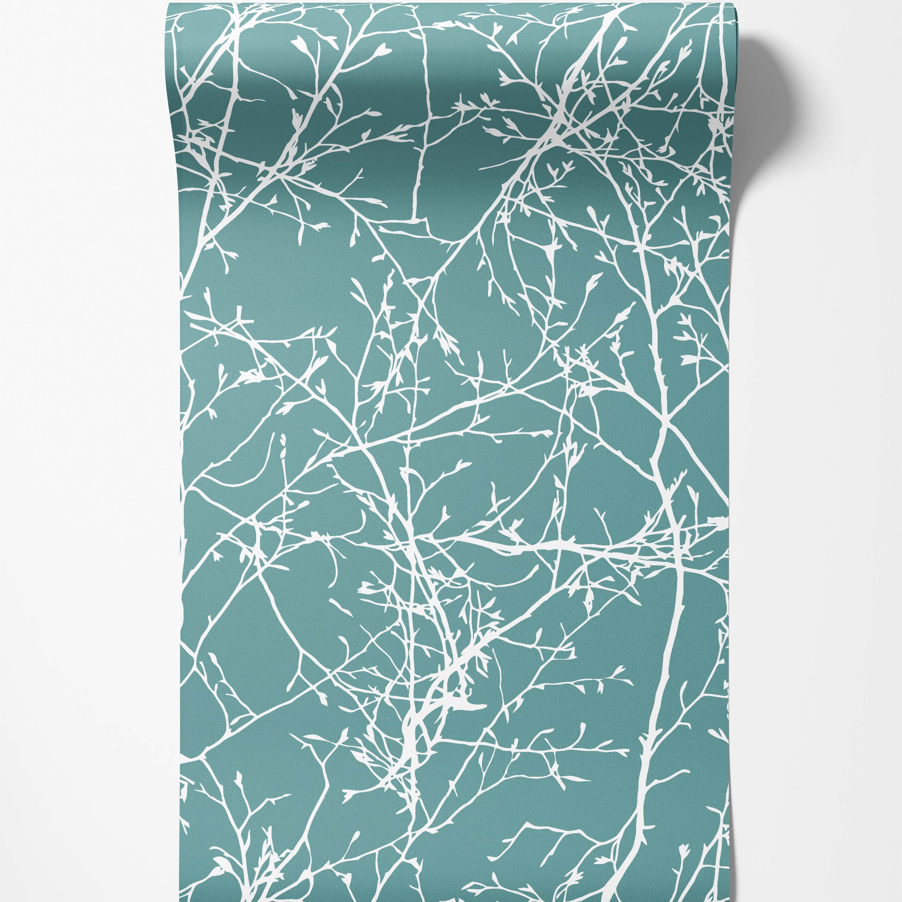 A wallpaper featuring a delicate pattern of white tree branches with small buds on a solid teal background.