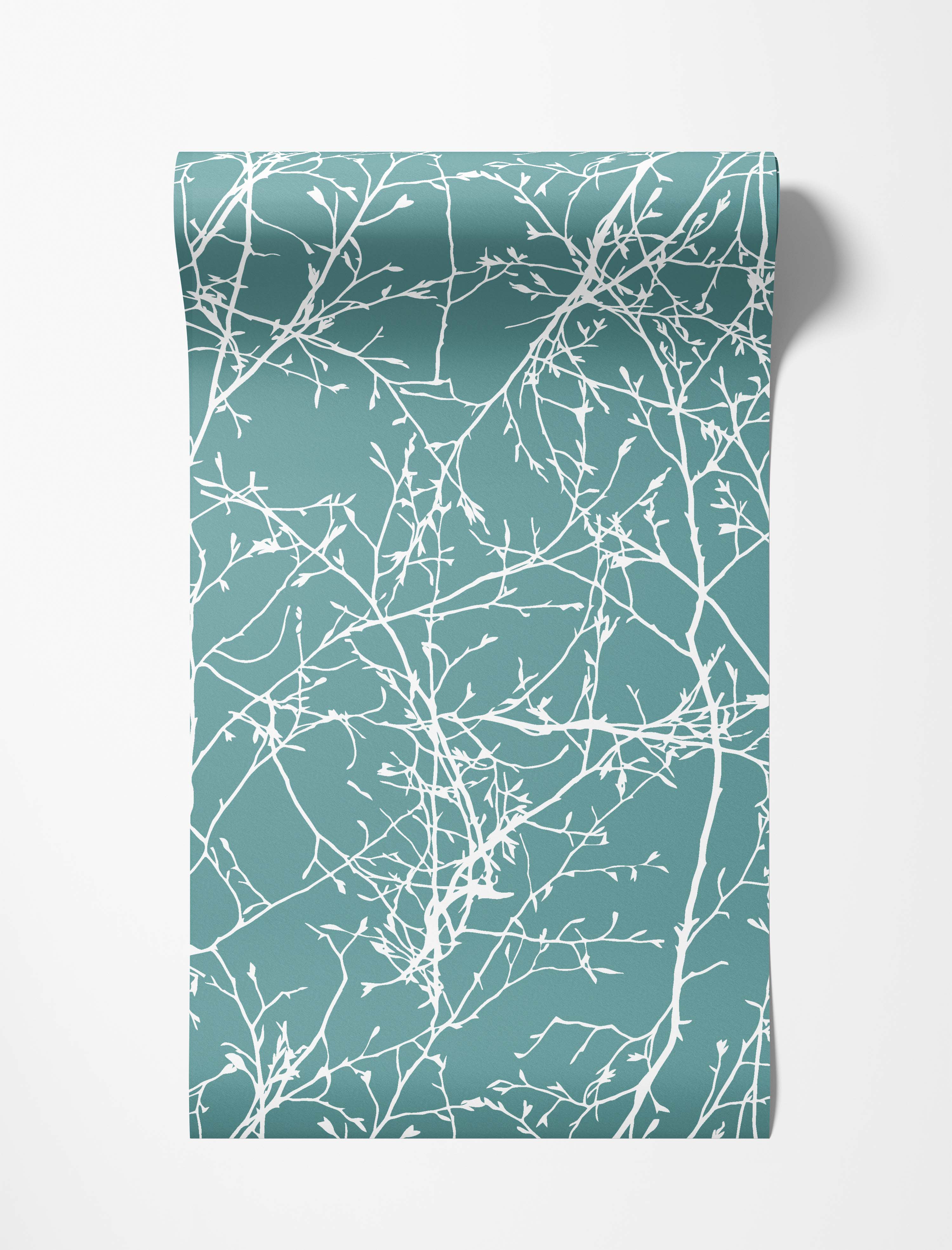 A wallpaper featuring a delicate pattern of white tree branches with small buds on a solid teal background.