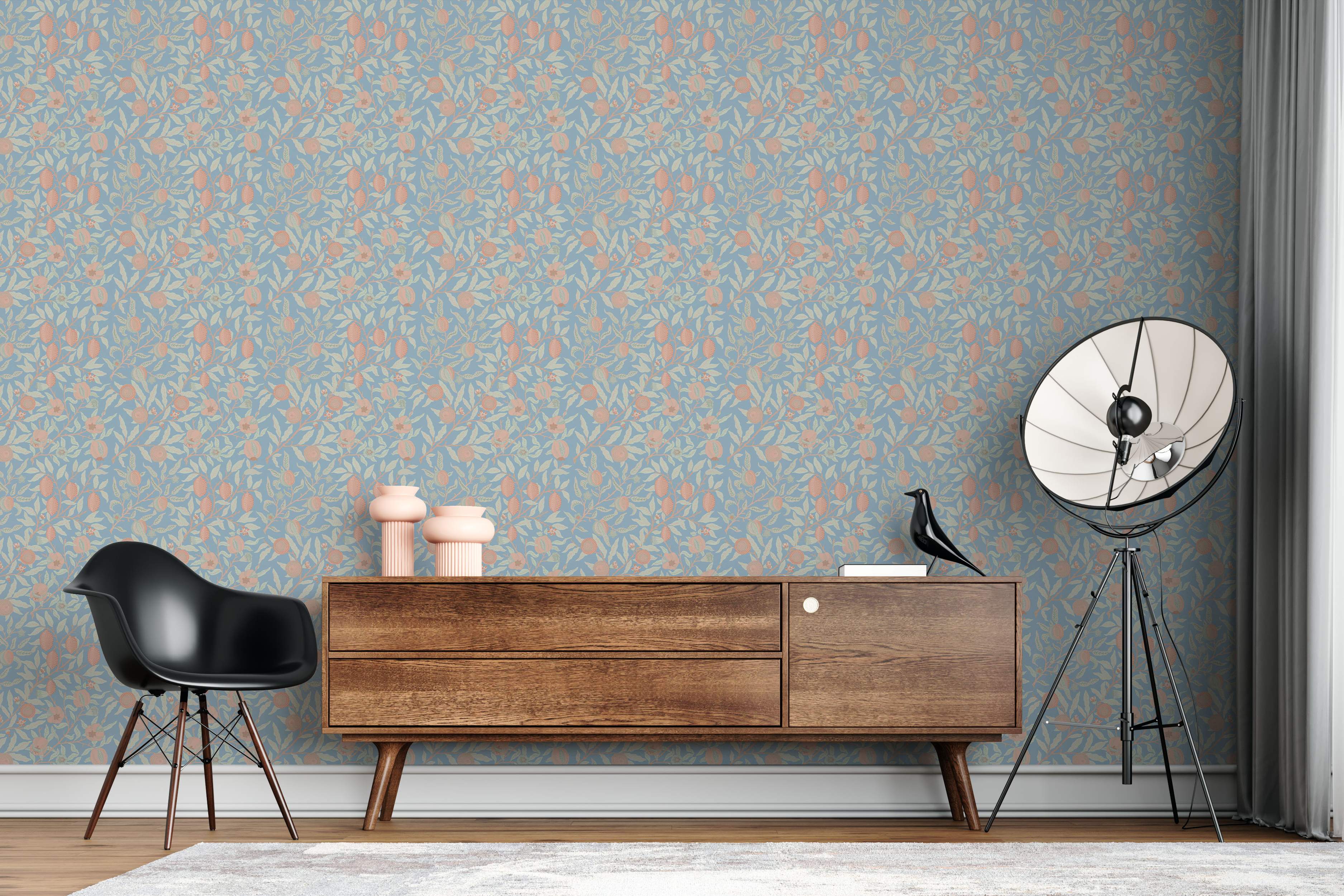 Botanical wallpaper with peach fruits and flowers on branches with pale leaves, set against a dusty blue background.