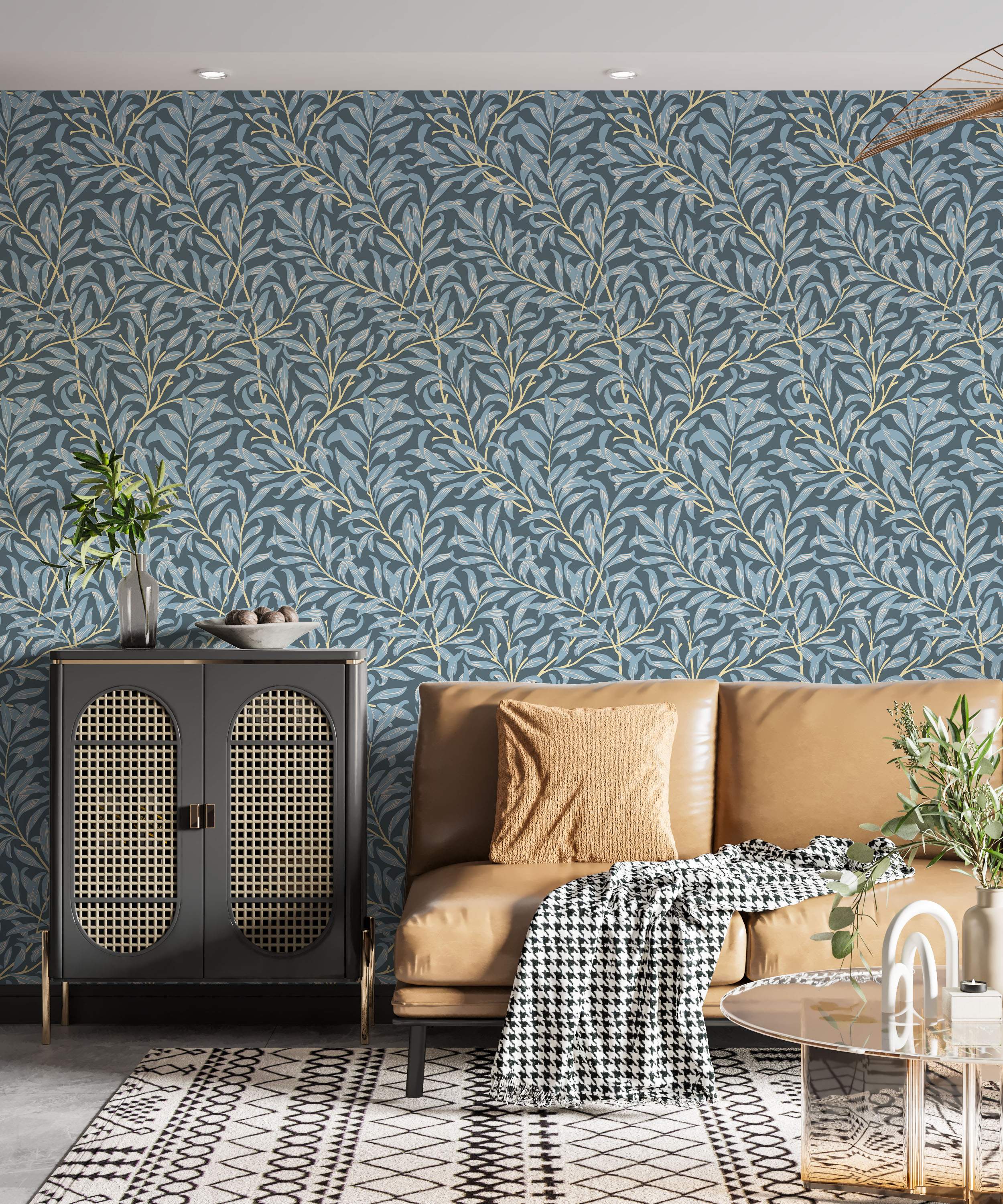 Wallpaper showing a repeating pattern of stylized light blue leaves on pale yellow branches over a dark blue-grey background.