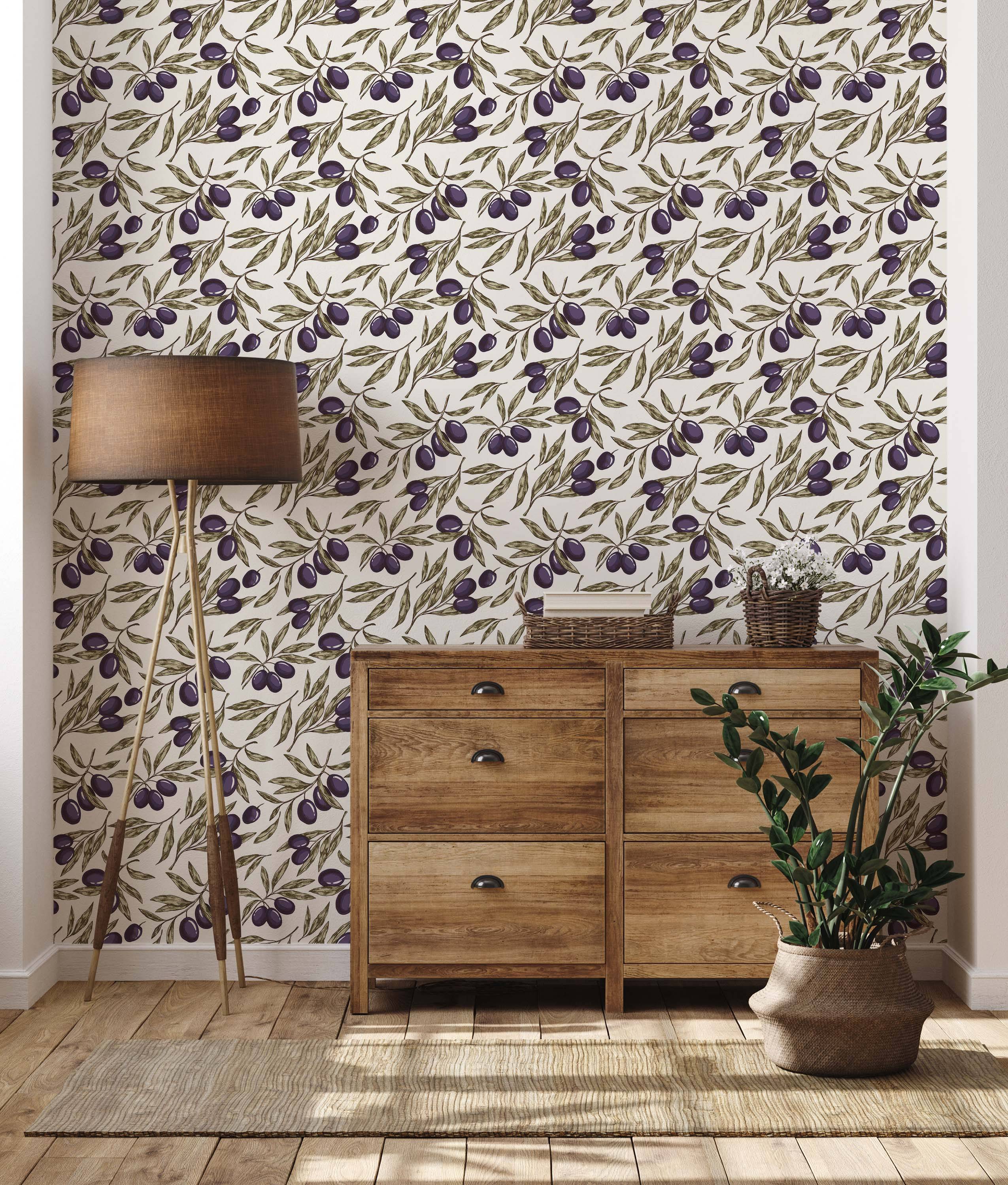 Wallpaper with a repeating pattern of olive branches, featuring purple olives and green leaves on a light cream background.