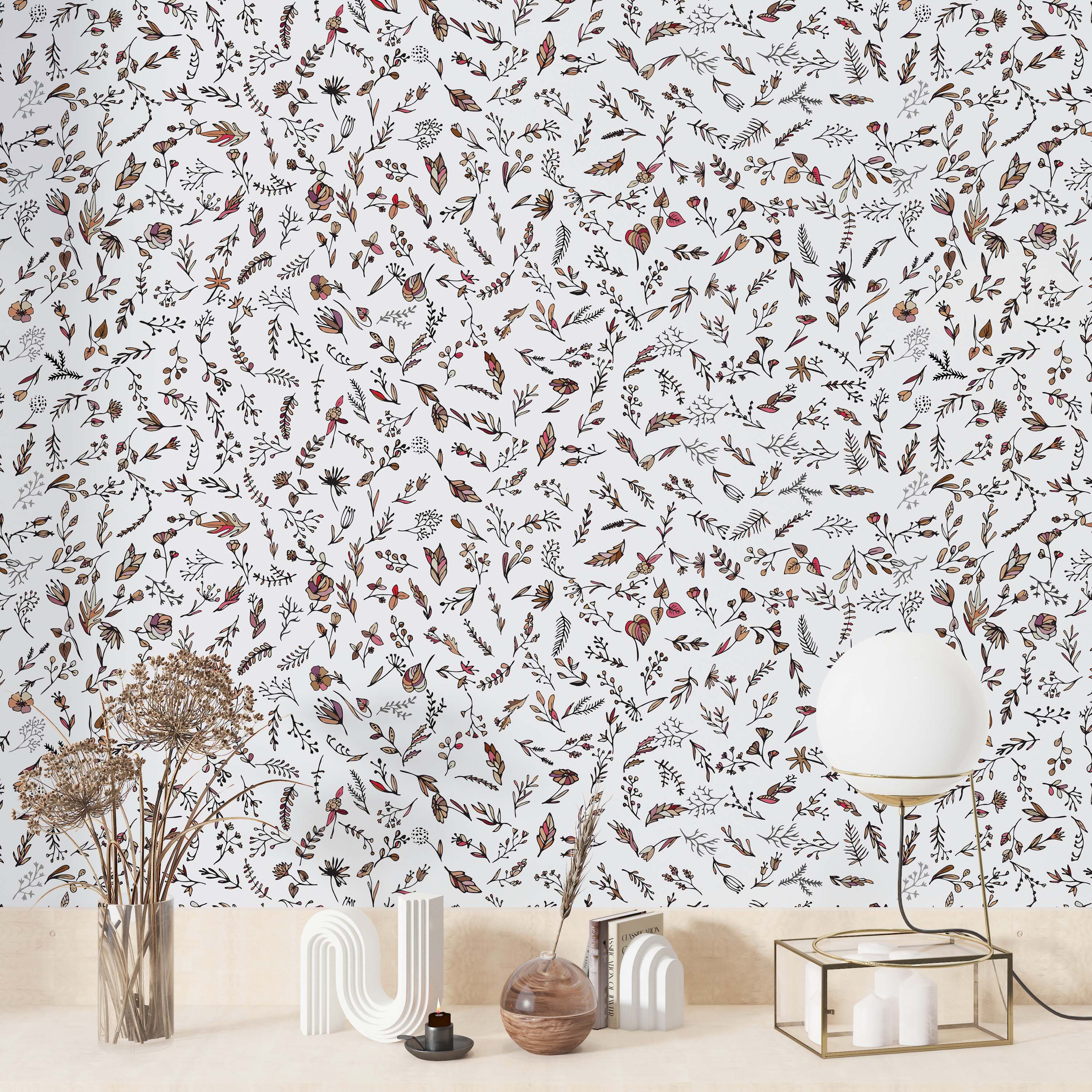 Delicate wallpaper featuring hand-drawn botanical sprigs, leaves, and flowers in brown, pink, and beige on a white background.