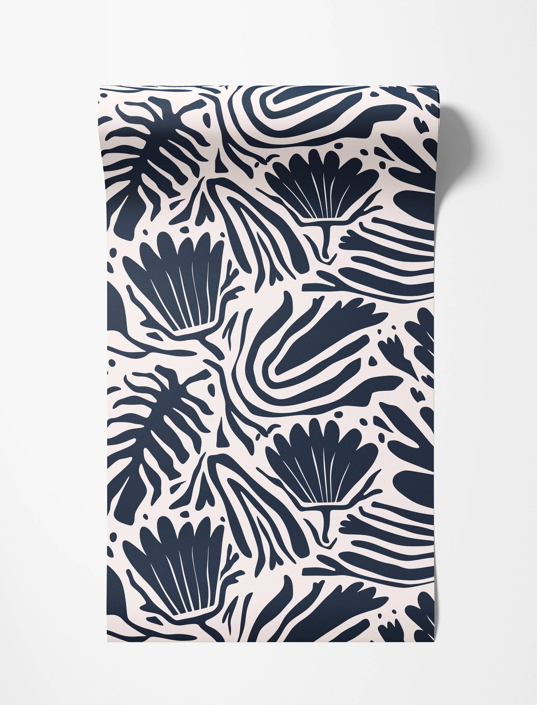 Wallpaper featuring a bold, graphic pattern of stylized navy blue leaves, flowers, and abstract stripes on a cream background.