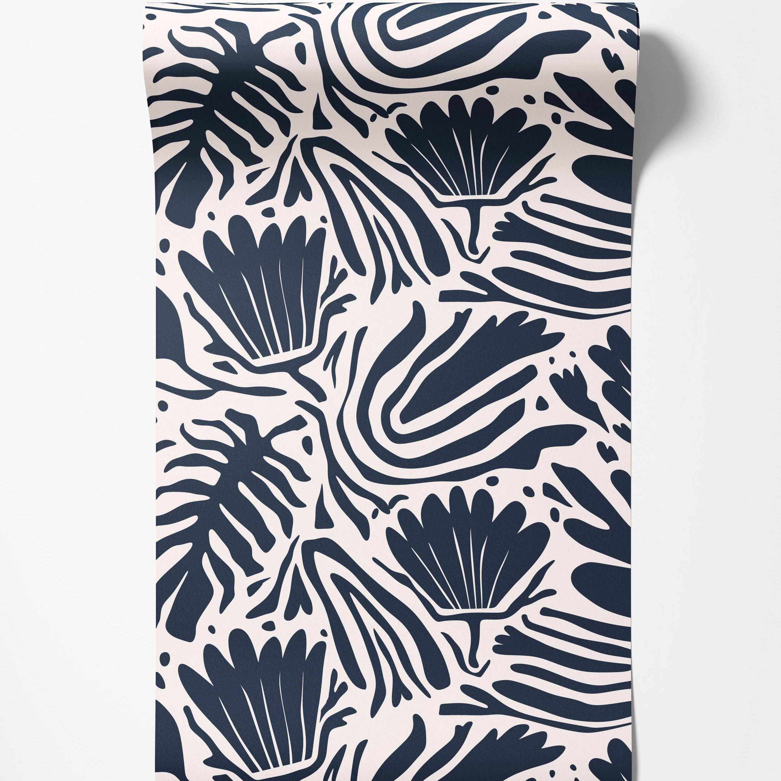 Wallpaper featuring a bold, graphic pattern of stylized navy blue leaves, flowers, and abstract stripes on a cream background.
