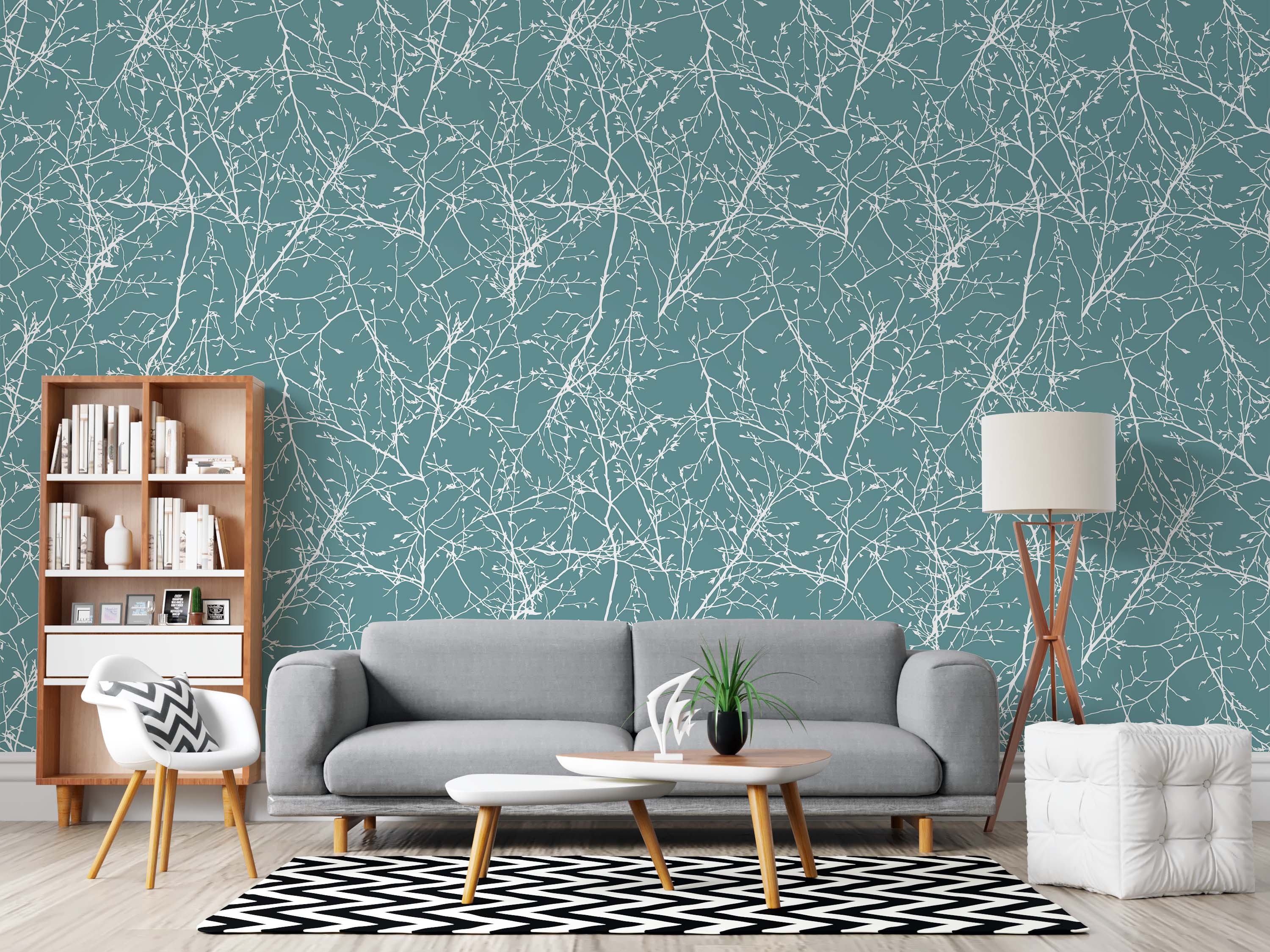 A nature-inspired wallpaper featuring a dense pattern of delicate white tree branches and buds on a solid teal background.