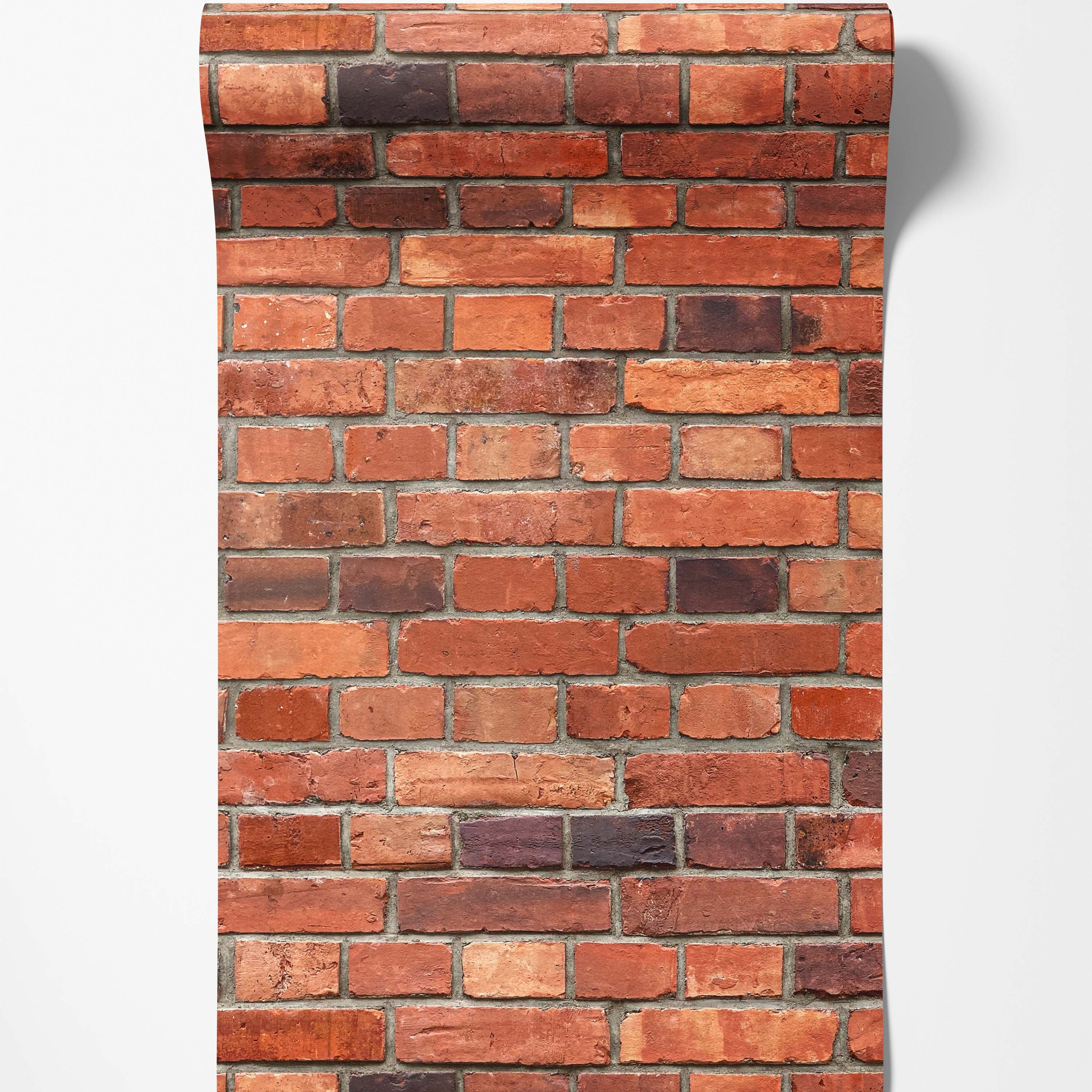 Realistic red brick wallpaper with varied shades of red, orange, and dark brown bricks, detailed with grey mortar lines.