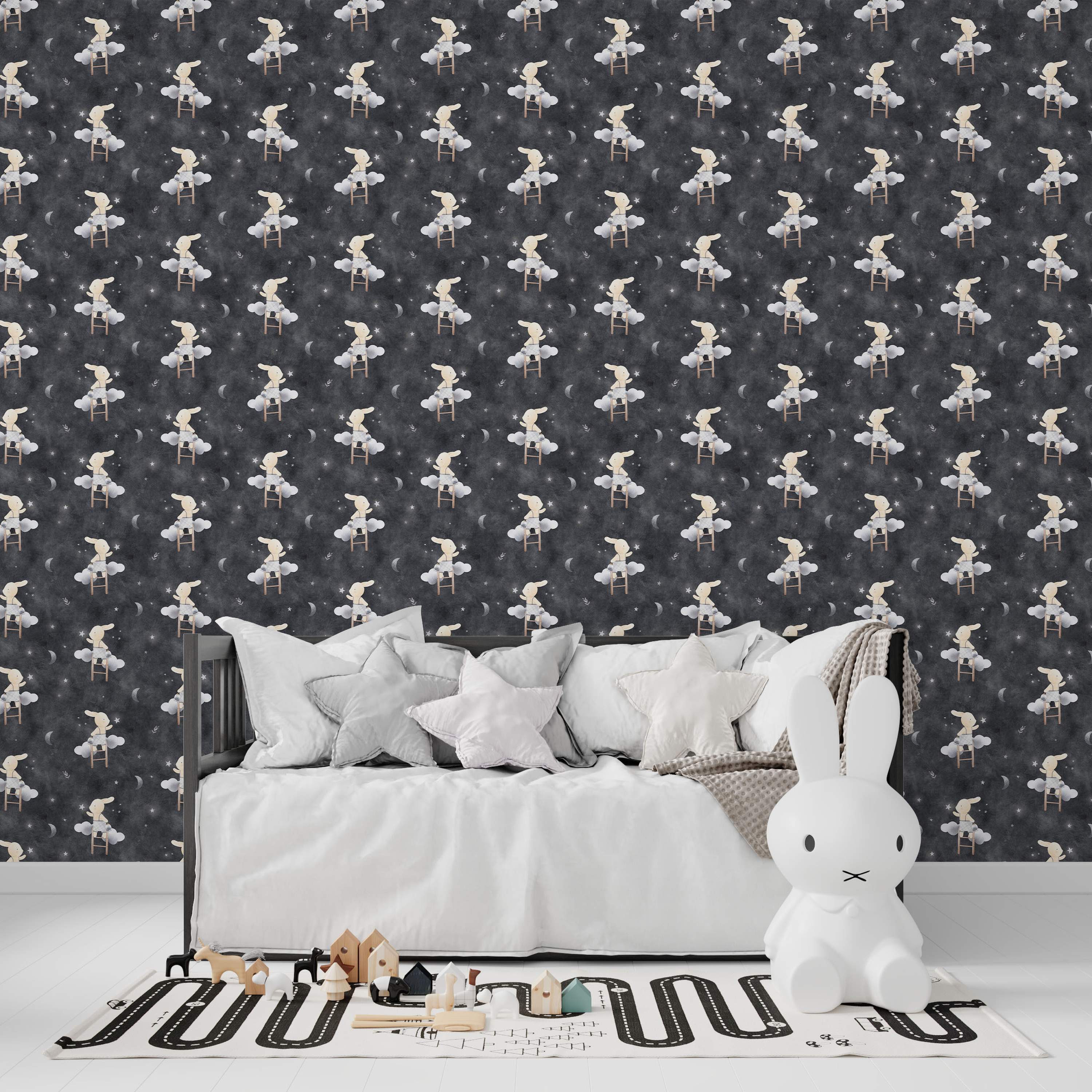 Illustrative wallpaper featuring cream bunnies climbing ladders on clouds against a dark gray night sky with moons and stars.