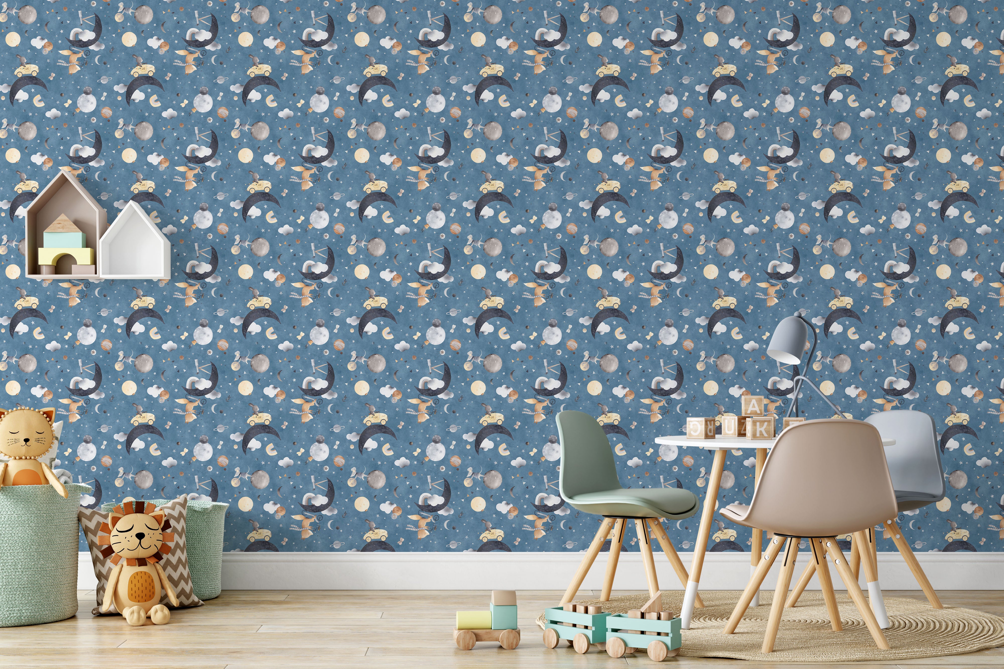 Whimsical children's wallpaper featuring watercolor bunnies, moons, planets, stars, and clouds on a blue background.