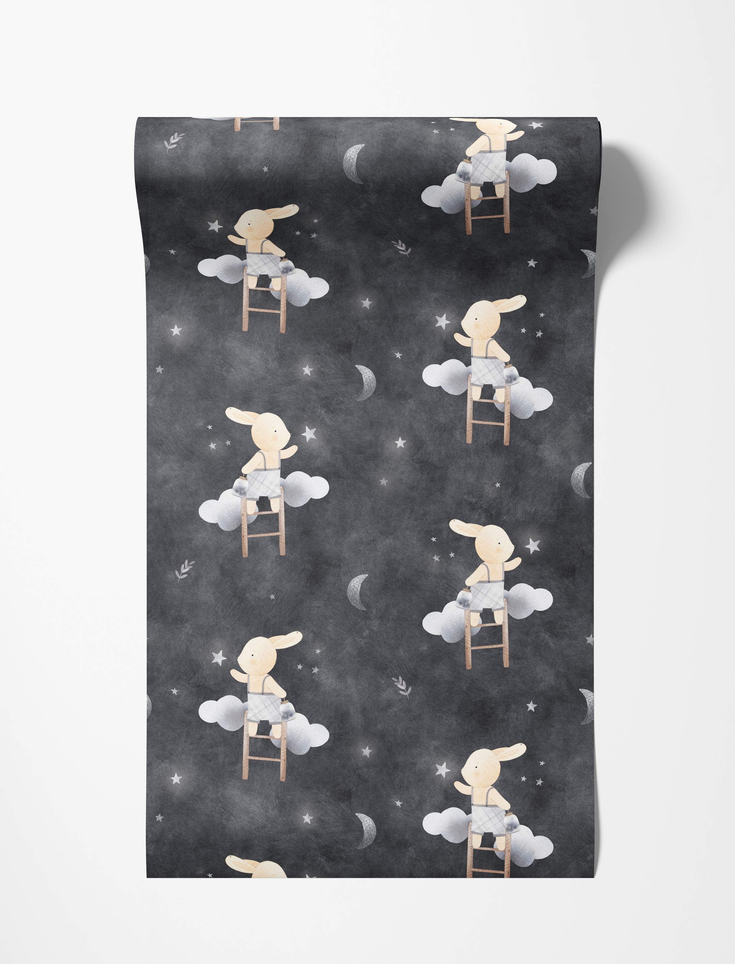 Whimsical wallpaper featuring bunnies on ladders reaching for stars and moons amidst clouds on a dark gray night sky background.