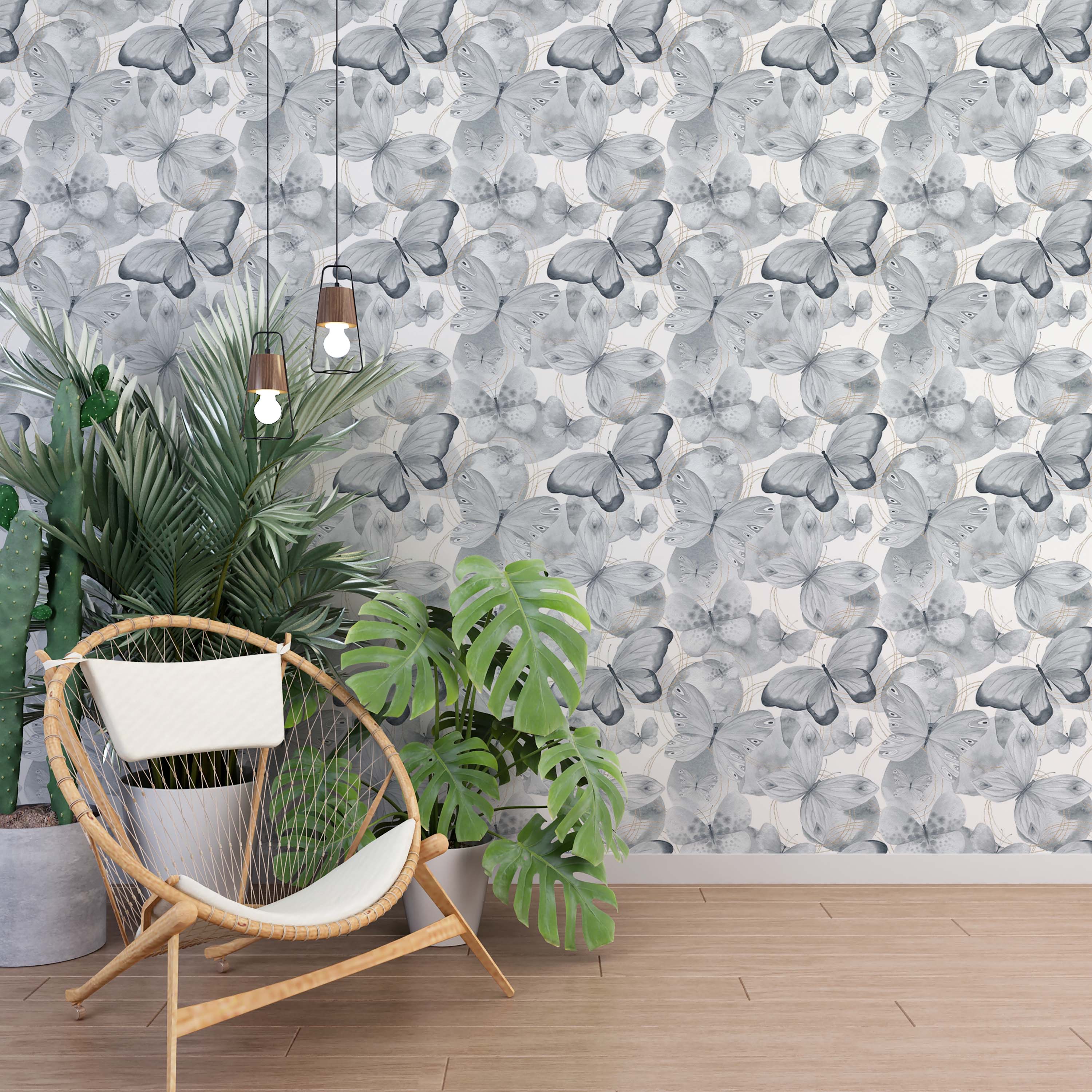 Repeating wallpaper pattern of grayscale butterflies in a watercolor style, with subtle gold circular line details.