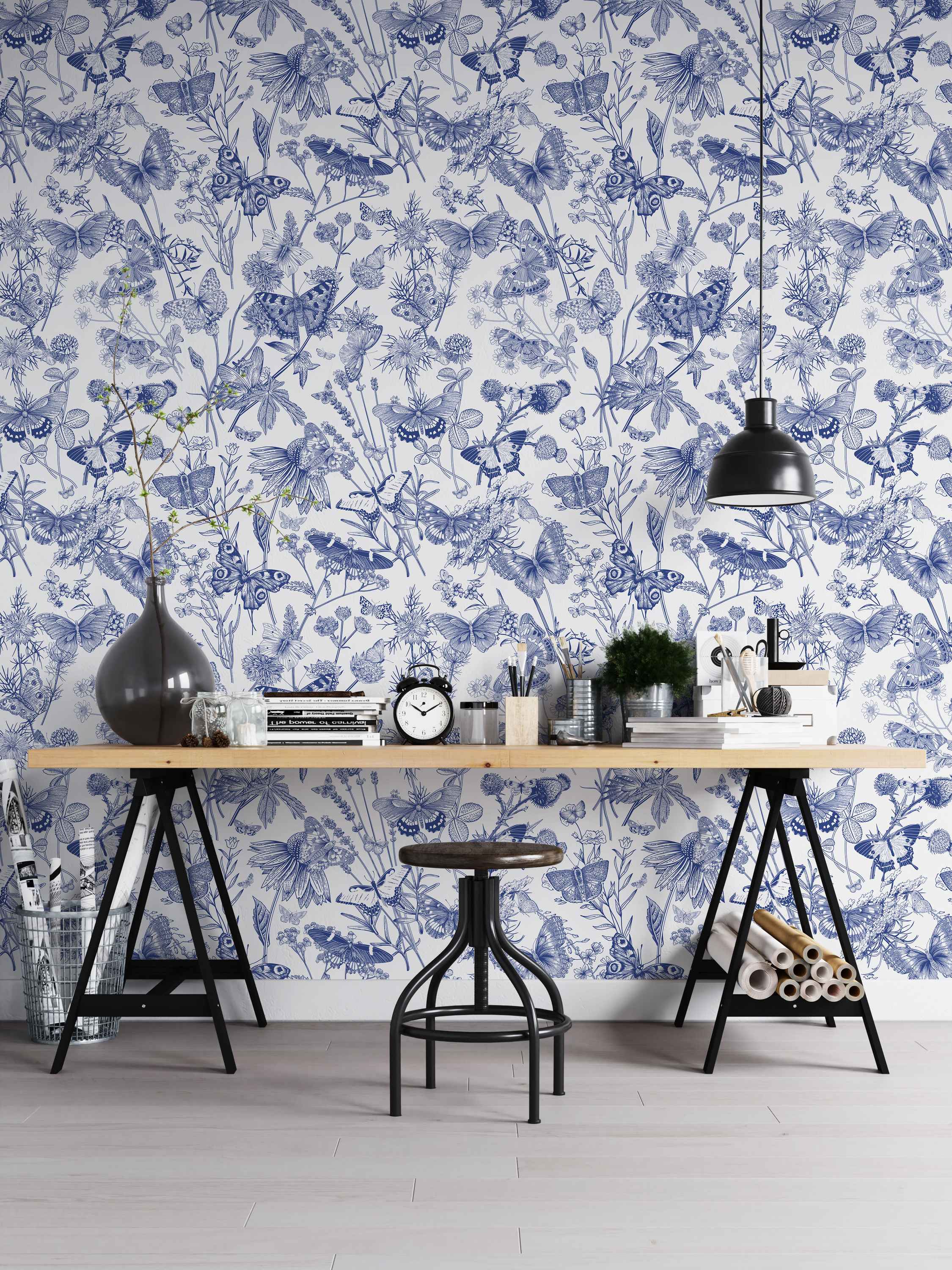 Blue line art wallpaper depicting sketched butterflies and various wildflowers on a white background in a dense repeating pattern.