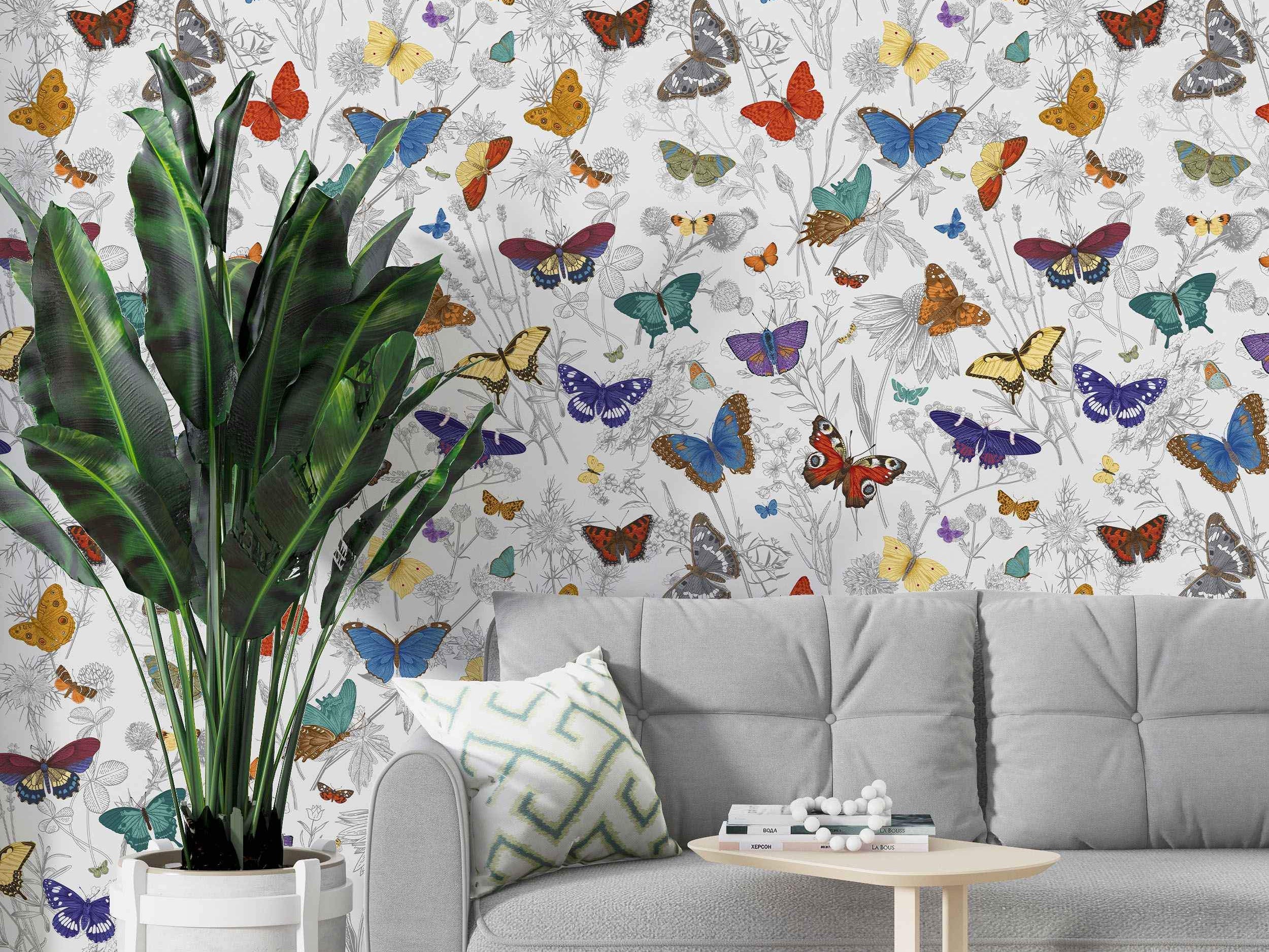 Wallpaper featuring colorful butterflies in various bright hues scattered among delicate gray floral line drawings on a light background.