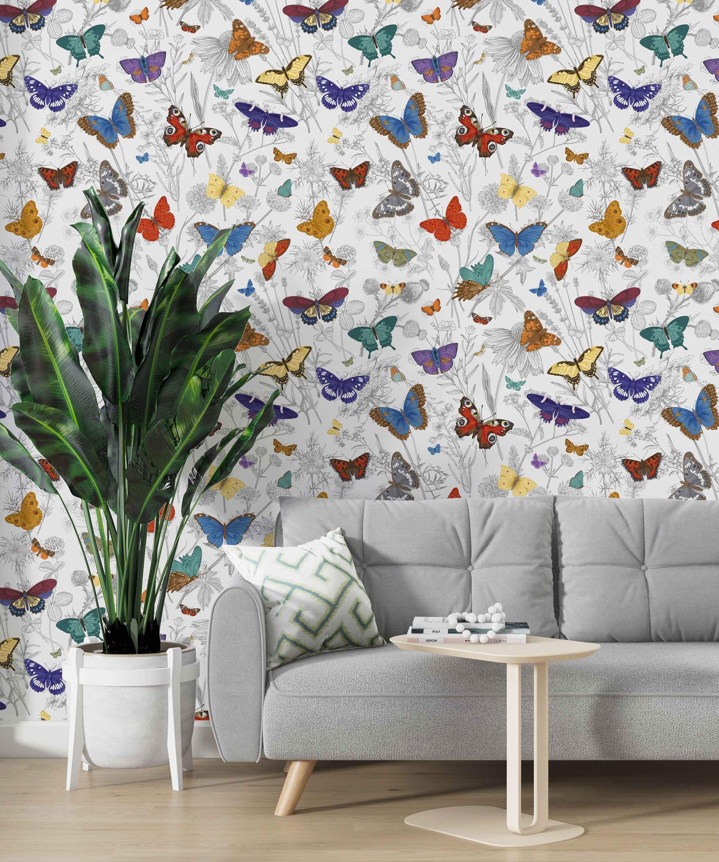 Wallpaper featuring colorful butterflies in various bright hues scattered among delicate gray floral line drawings on a light background.