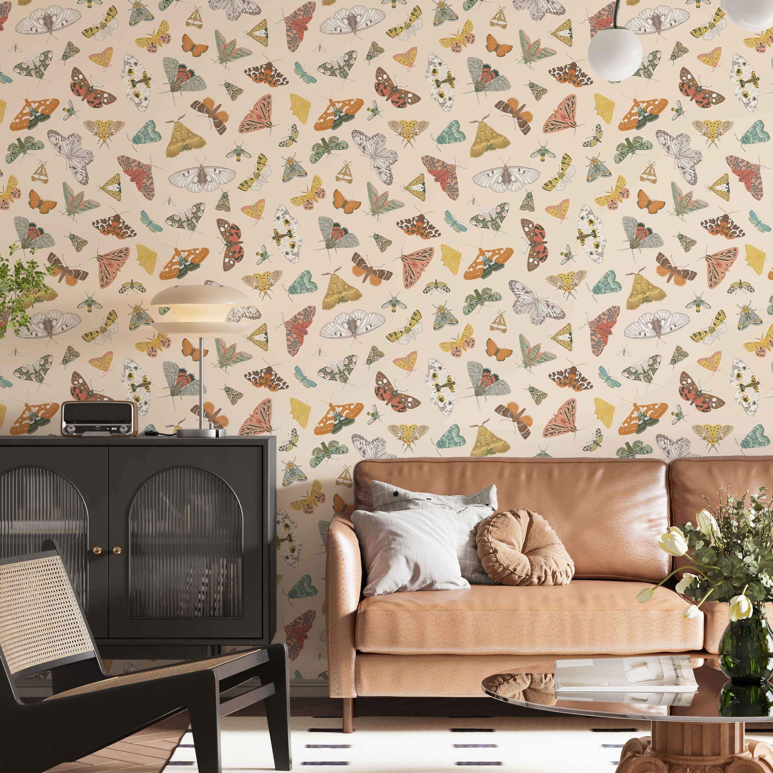 Colorful butterfly and moth pattern on beige wallpaper.