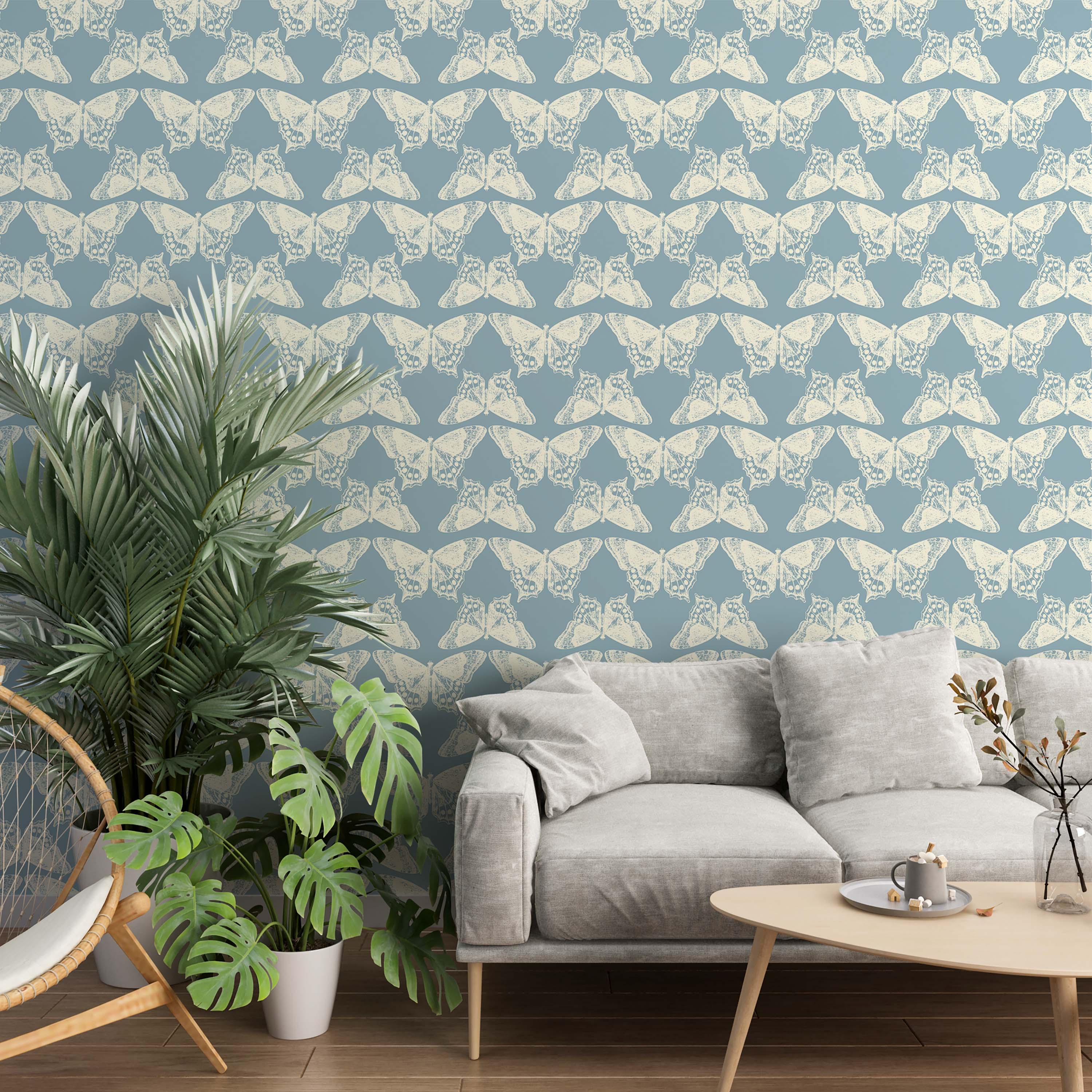 A repeating wallpaper pattern of illustrative, off-white butterflies arranged in rows on a dusty blue background.