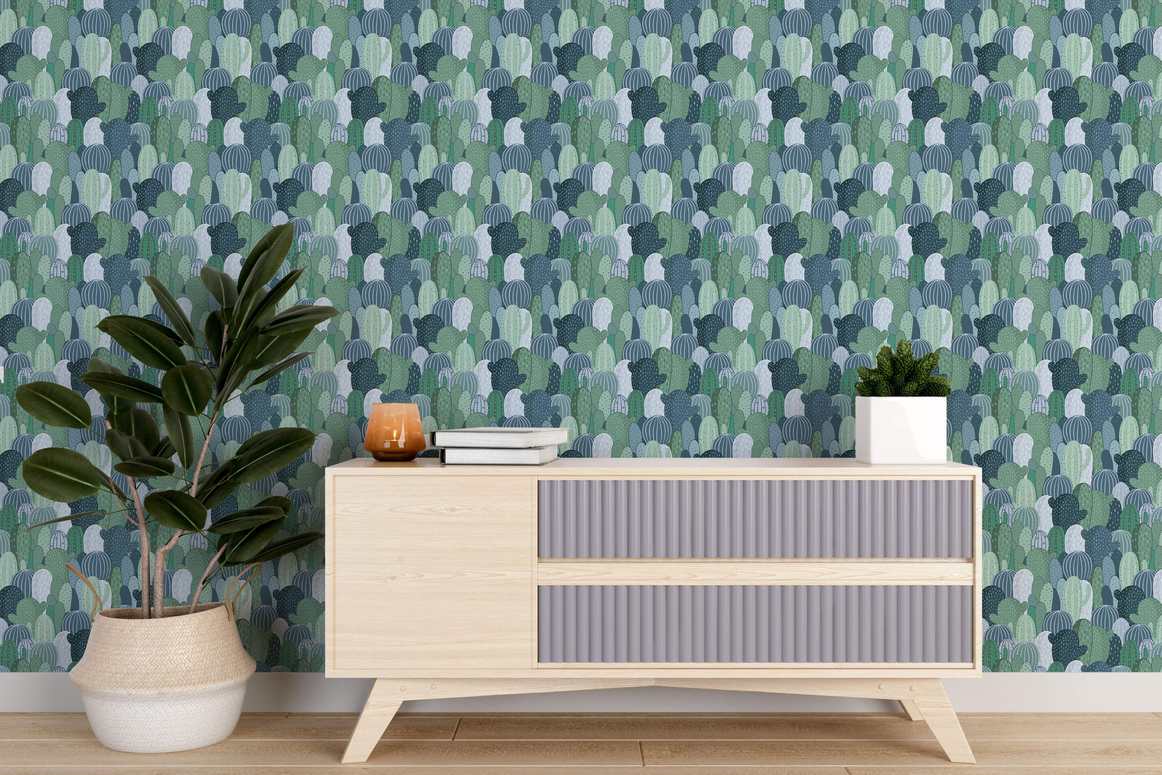 Wallpaper featuring a dense pattern of illustrated cacti in various shapes and sizes, rendered in shades of green, teal, and pale blue.