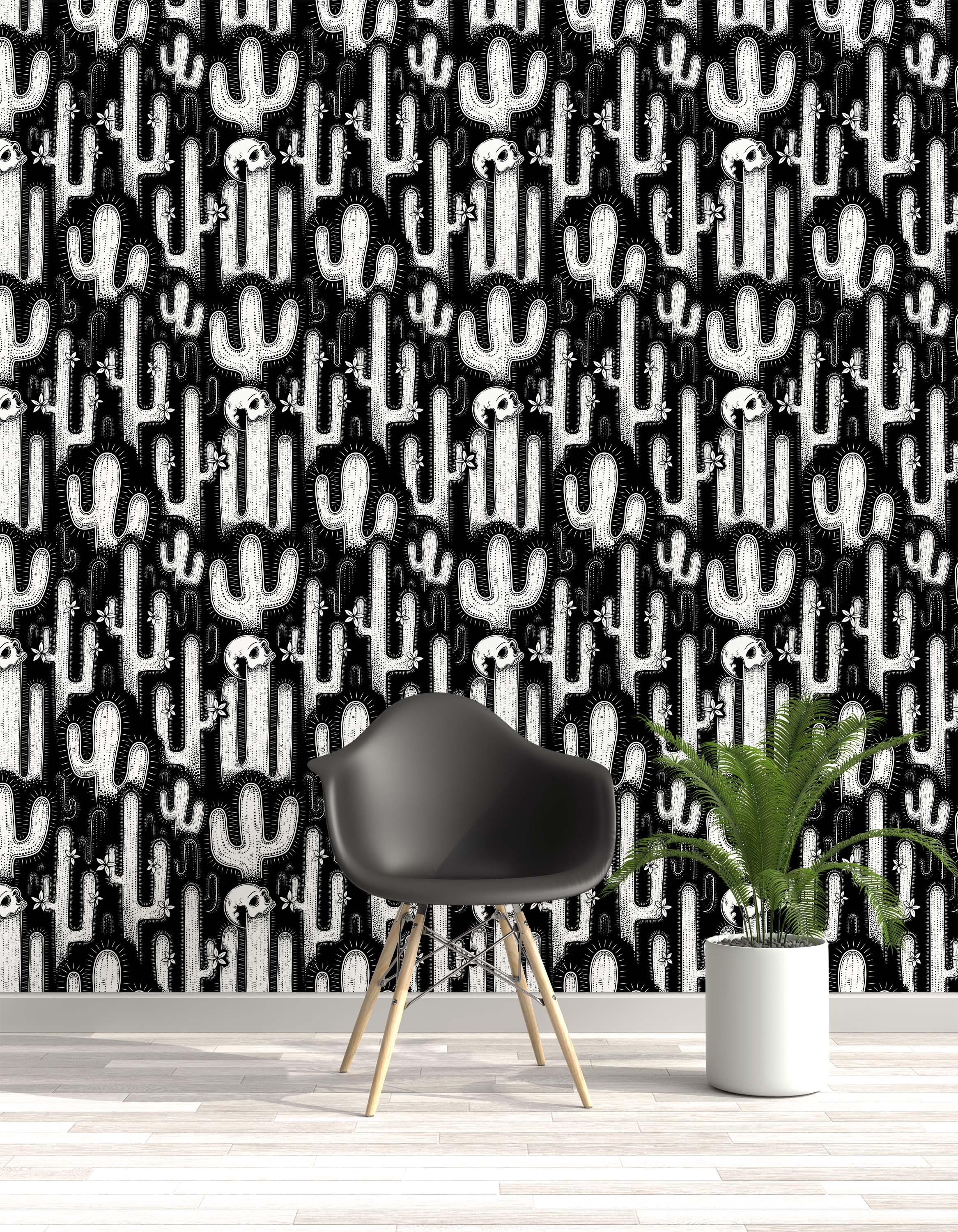 A graphic wallpaper with a linocut-style pattern of white cacti, skulls, and flowers on a solid black background.