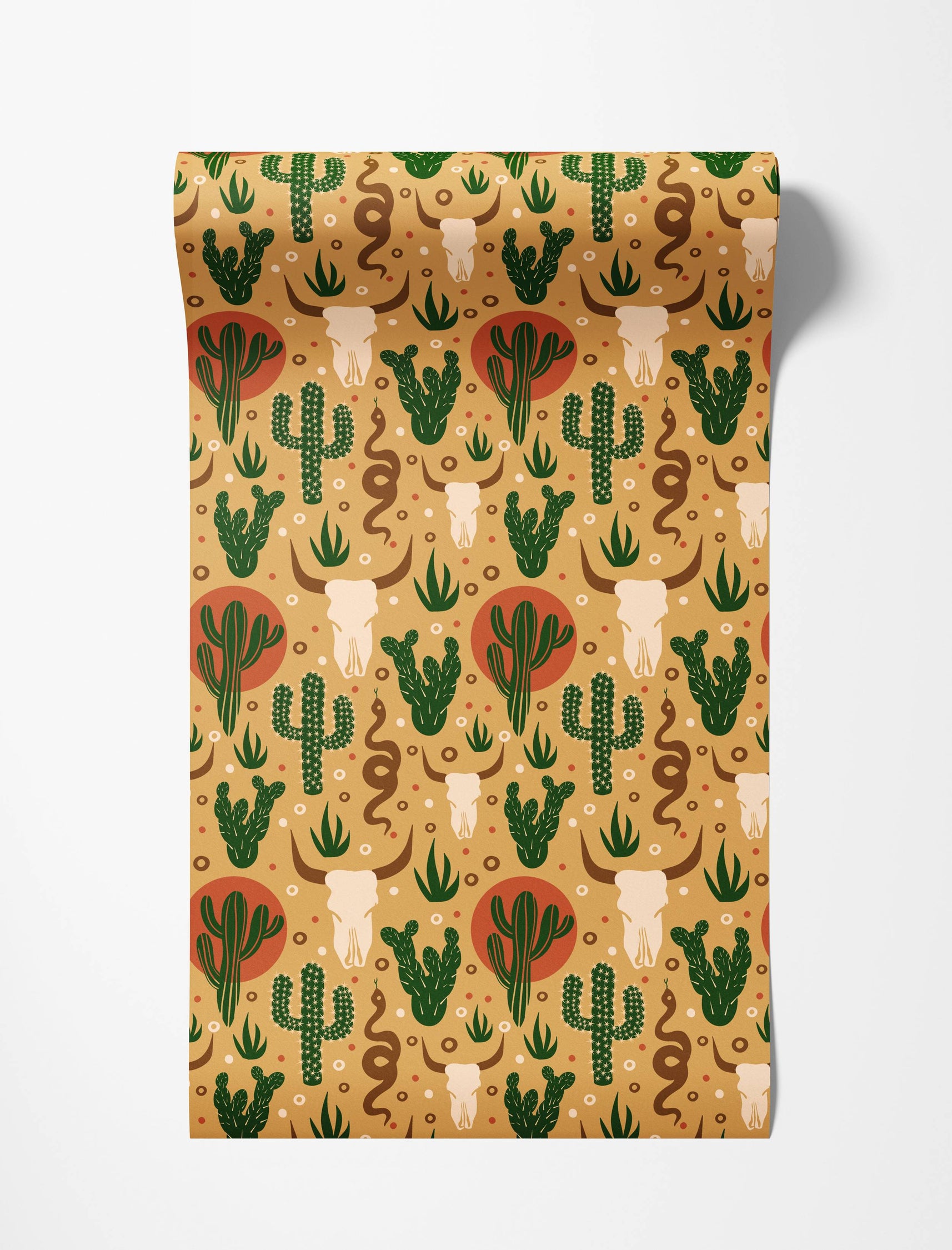 Graphic desert wallpaper with a pattern of green cacti, bull skulls, and brown snakes on a tan background with red accents.