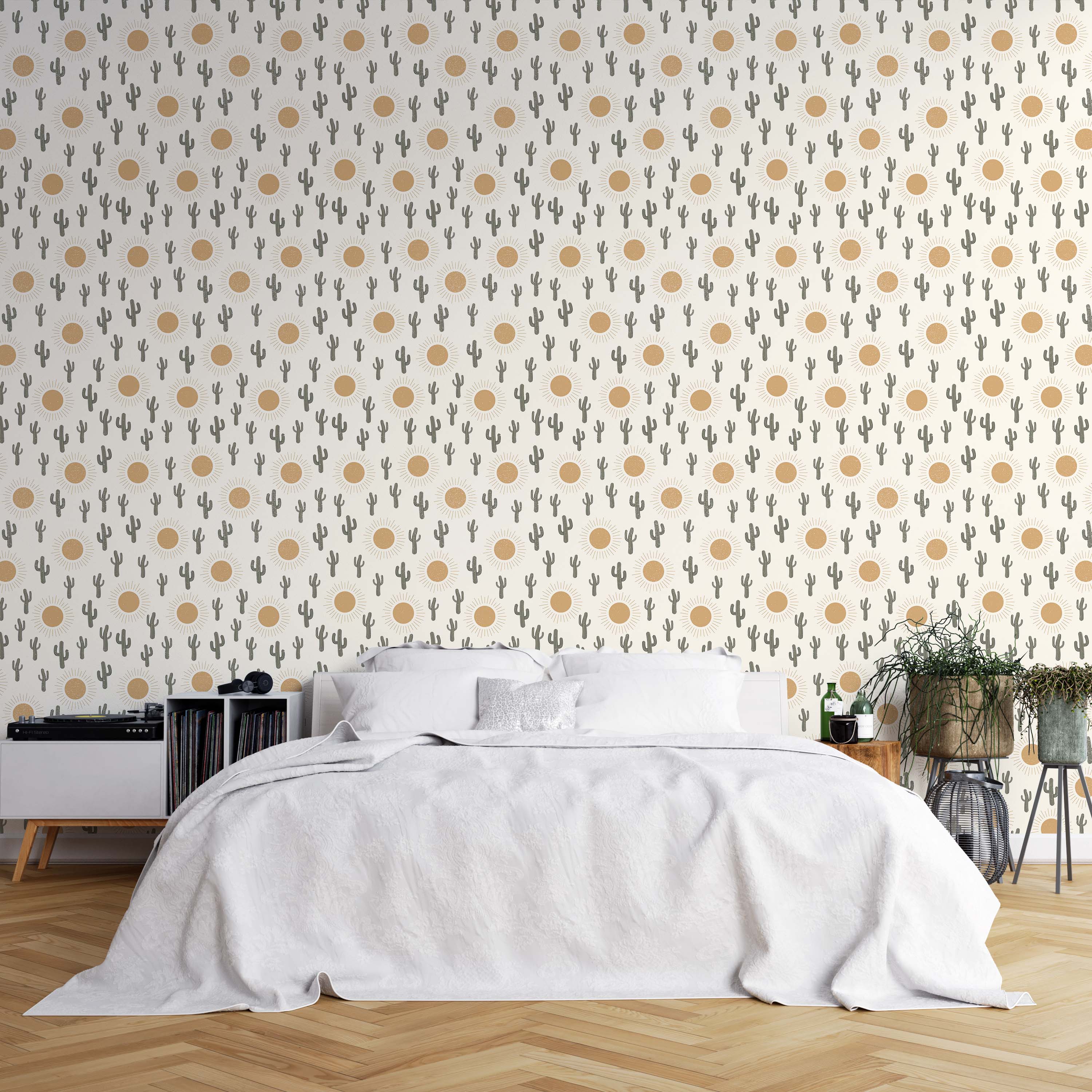 Wallpaper with a repeating pattern of stylized green saguaro cacti and golden-yellow suns on an off-white background.