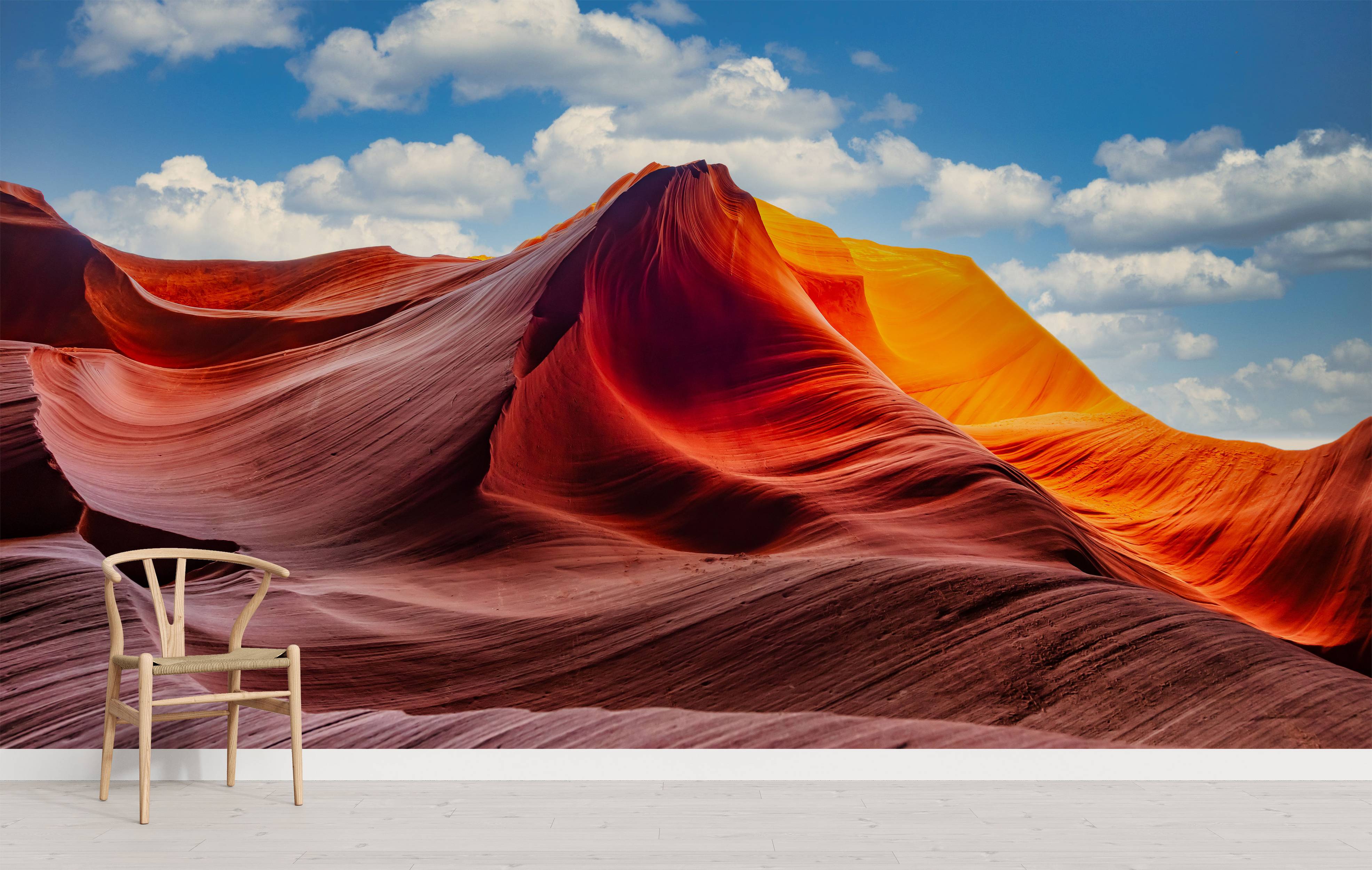 A photorealistic mural of a sunlit slot canyon, featuring flowing red and orange sandstone walls under a bright blue sky.