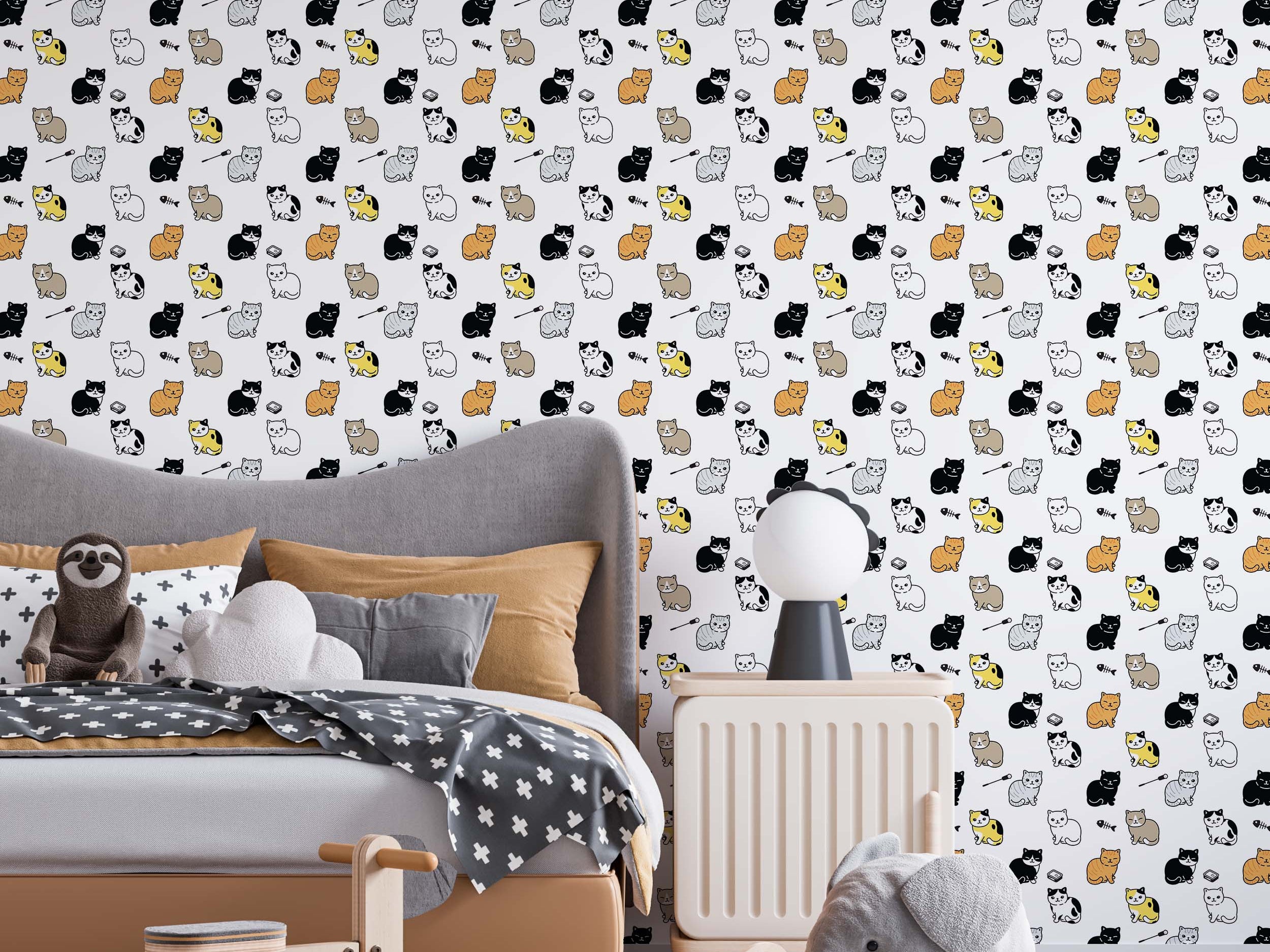 Wallpaper with a cute pattern of cartoon cats in black, white, gray, yellow, and orange on a light gray background.