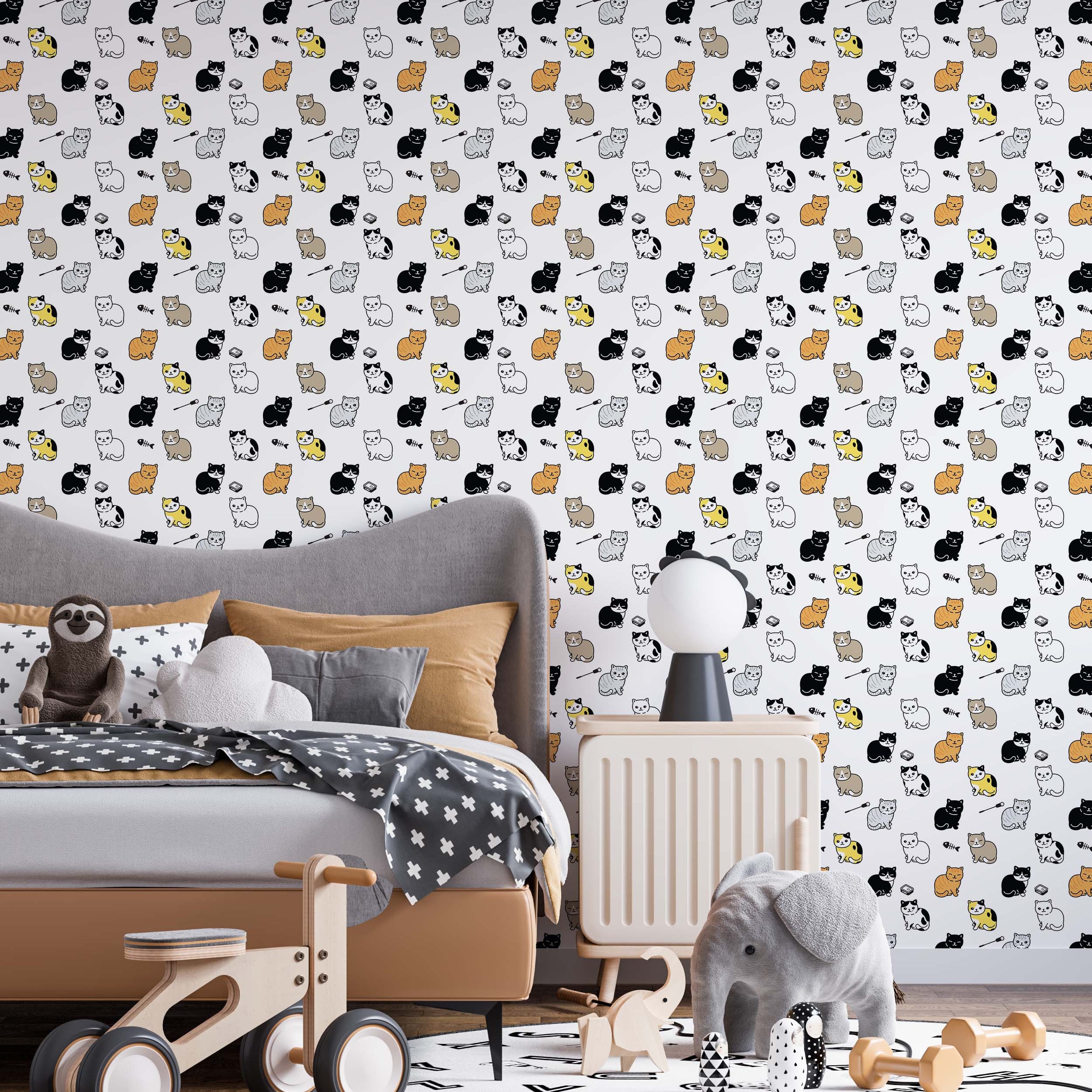 Wallpaper with a cute pattern of cartoon cats in black, white, gray, yellow, and orange on a light gray background.