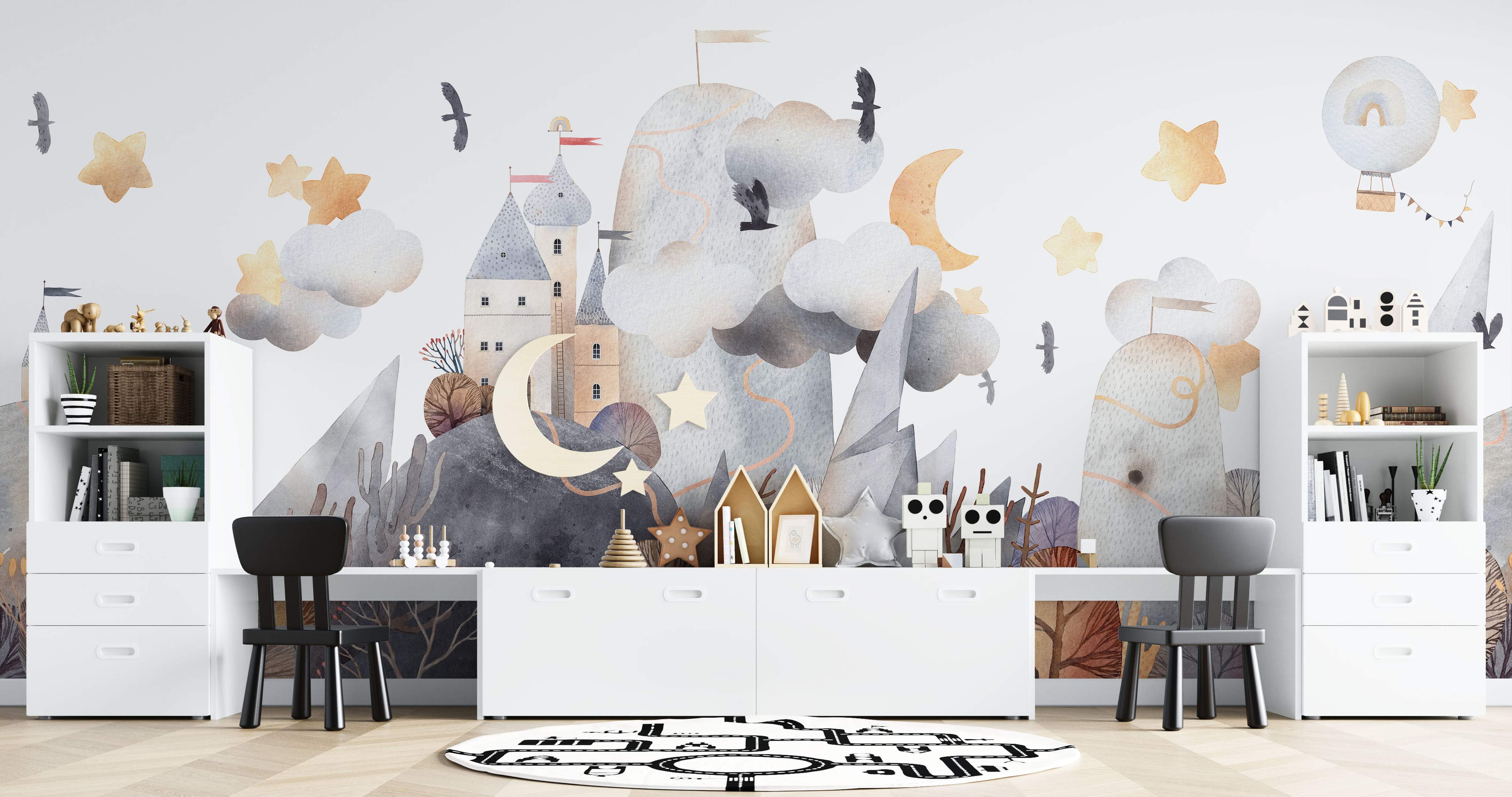 Whimsical watercolor mural depicting a castle landscape with mountains, clouds, stars, and moons in gray and beige tones.