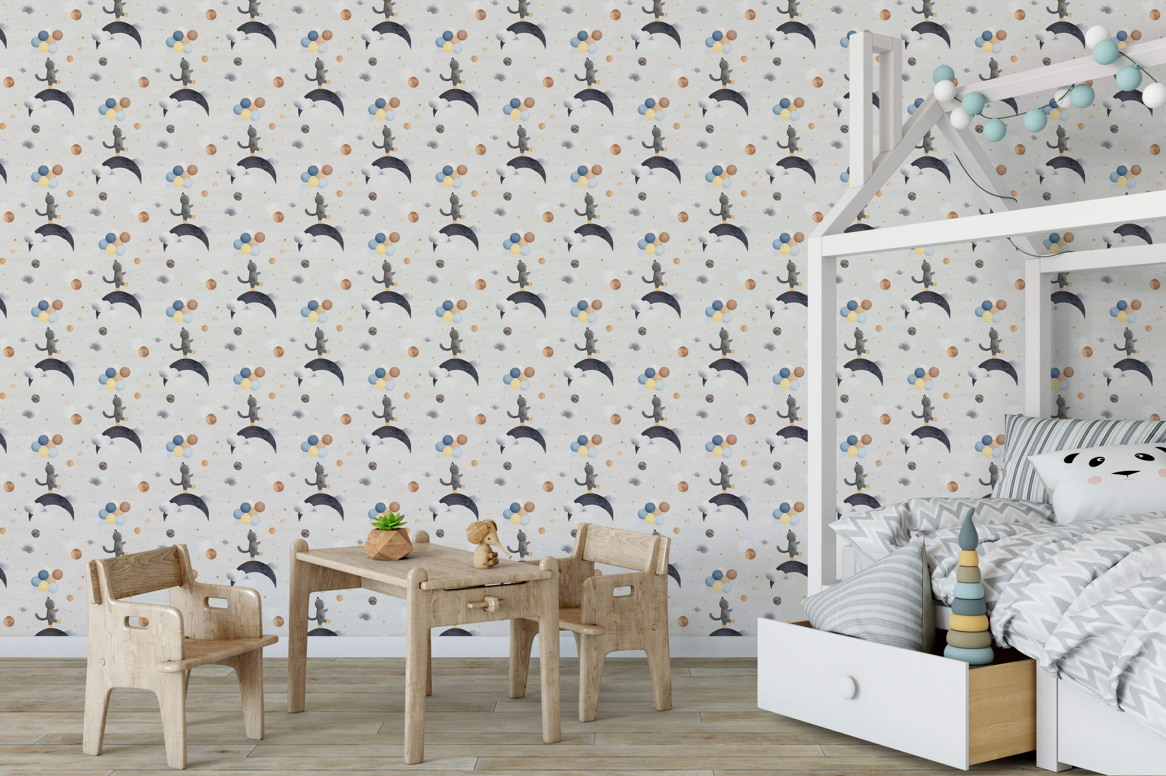 Children's wallpaper featuring grey cats walking on dark moons amid clouds, planets, stars, and balloon clusters in grey, blue, yellow.