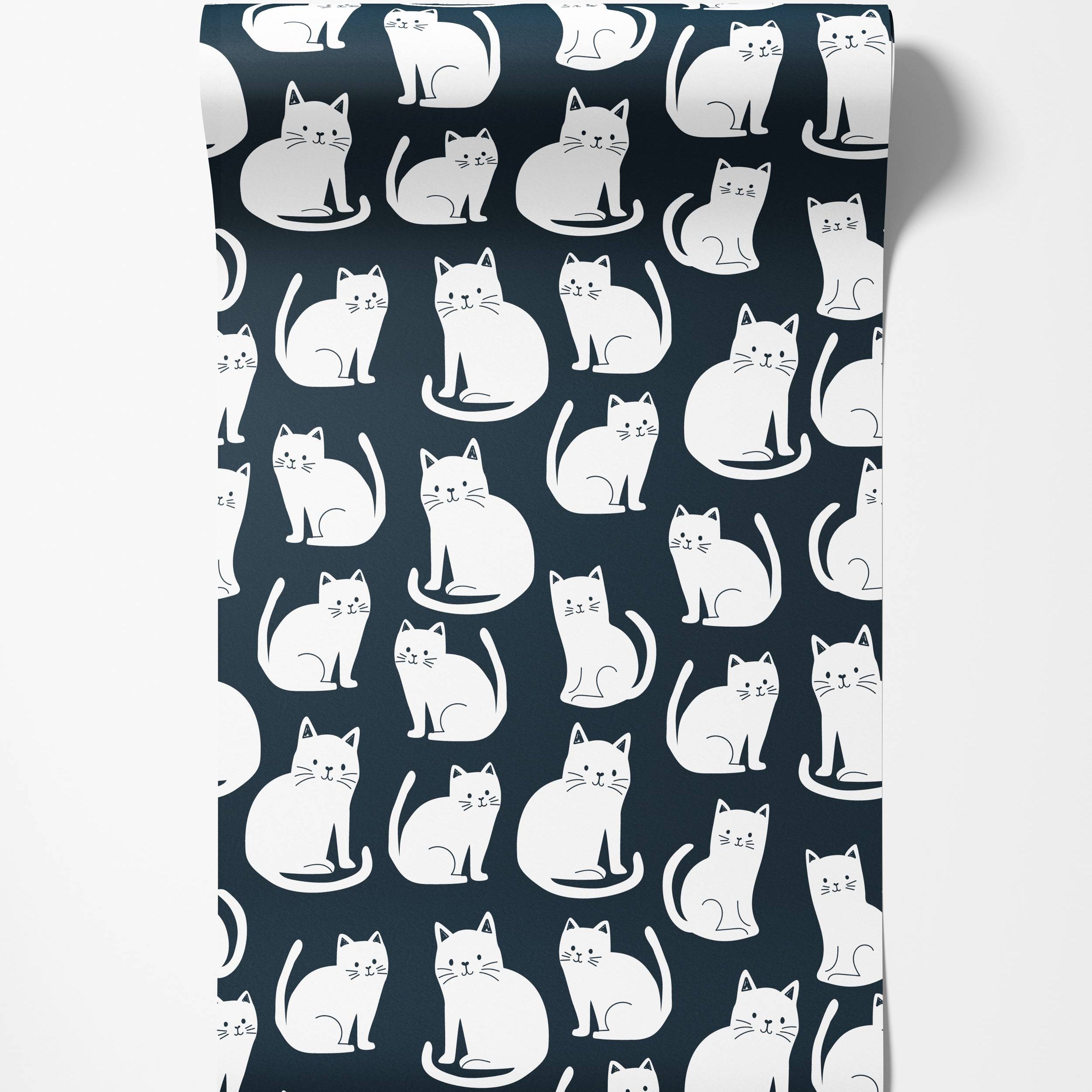 Wallpaper featuring a repeating pattern of simple white cartoon cats in various sitting poses on a dark navy blue background.