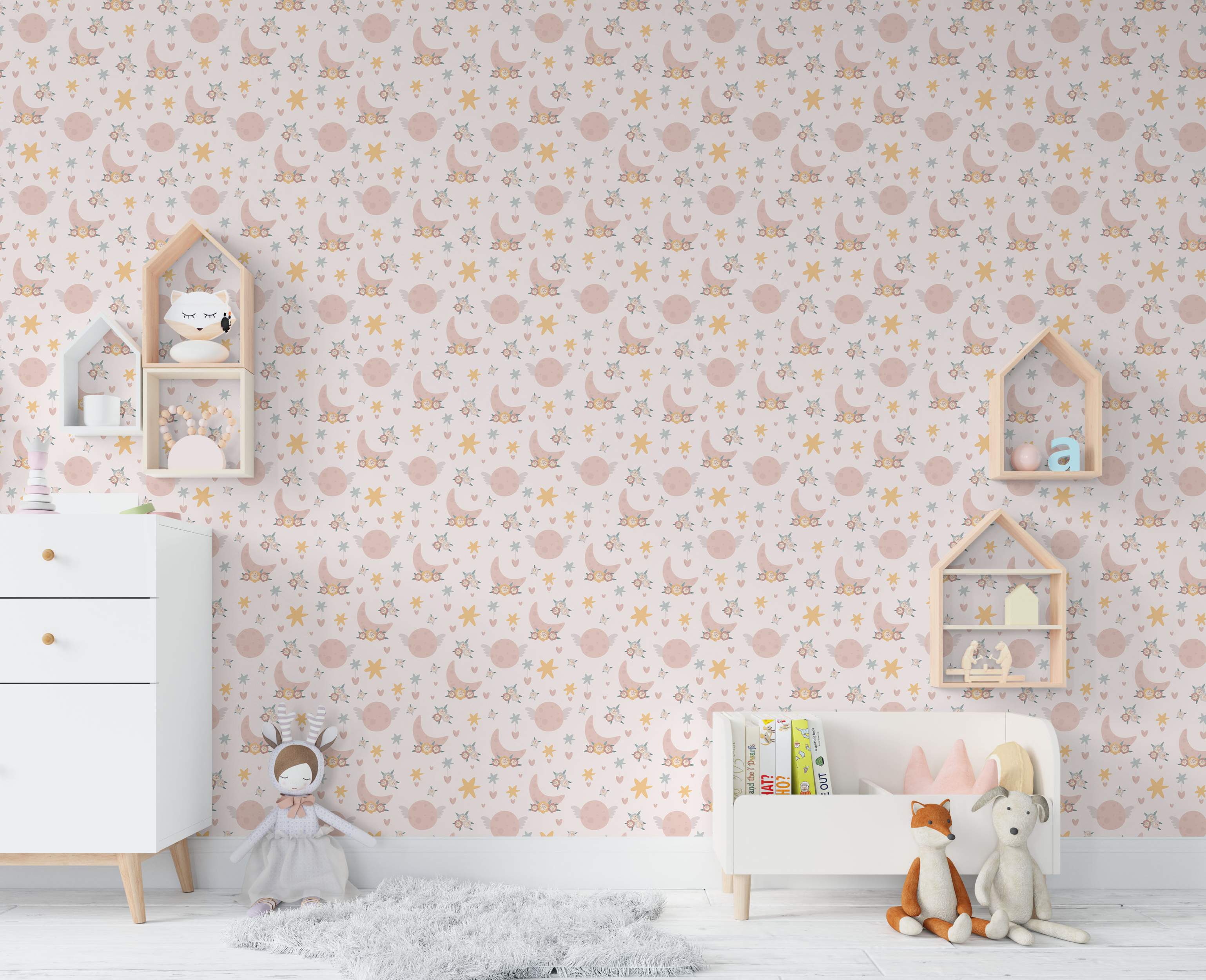 Whimsical wallpaper featuring pink floral moons, winged planets, yellow and blue stars, and hearts on a pale pink background.