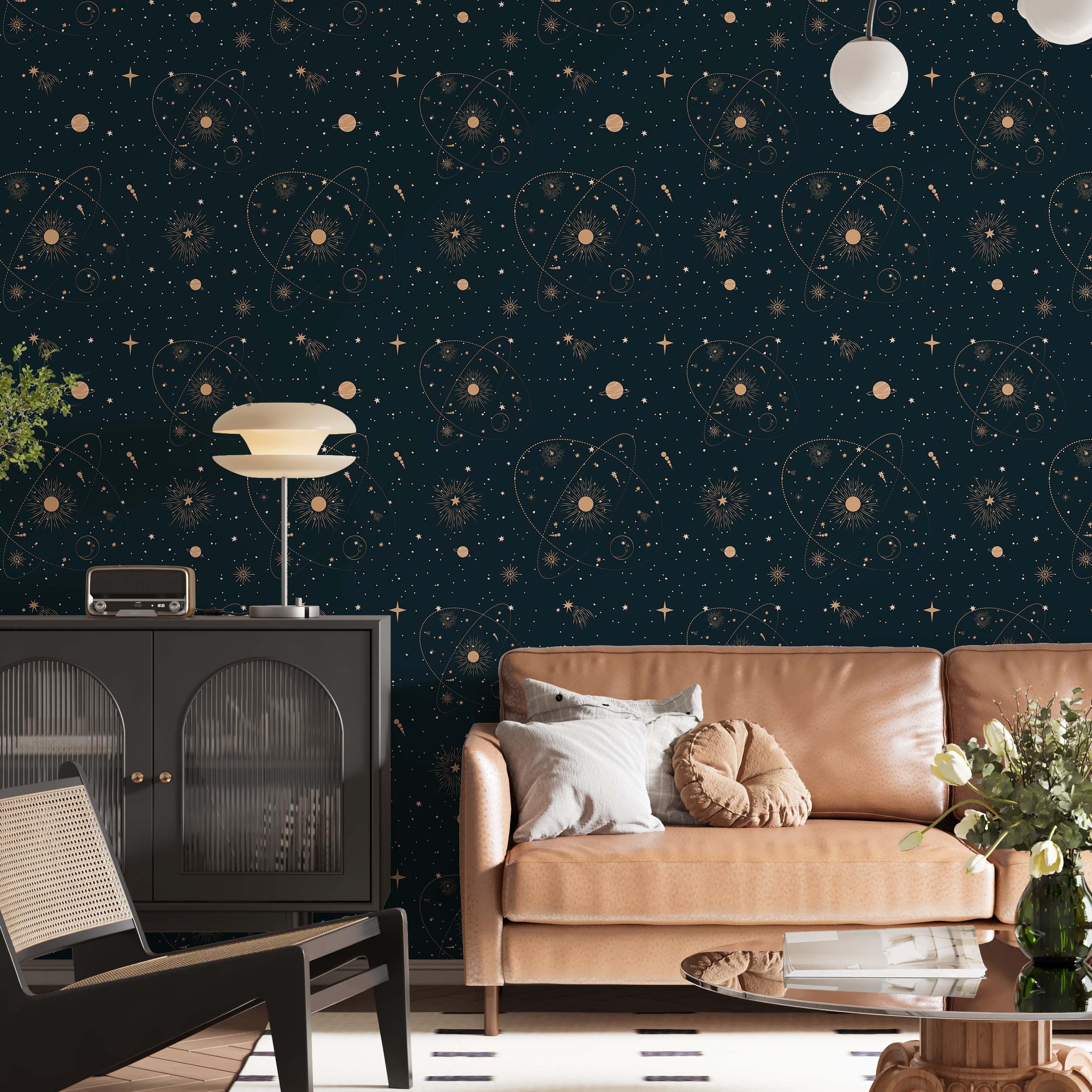 Dark blue wallpaper featuring a celestial pattern with gold stars, suns, planets, and orbital lines.