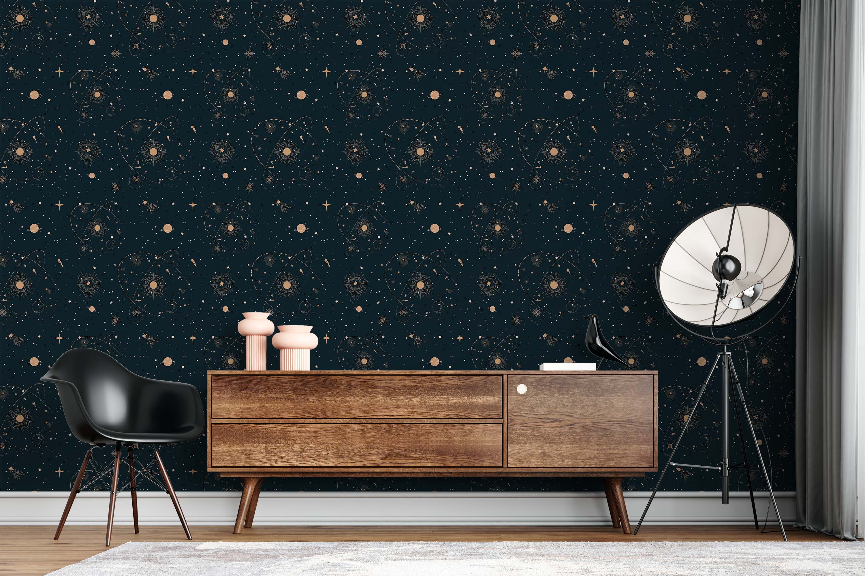 Dark navy wallpaper with a repeating pattern of gold celestial motifs including stars, planets, and orbital paths.