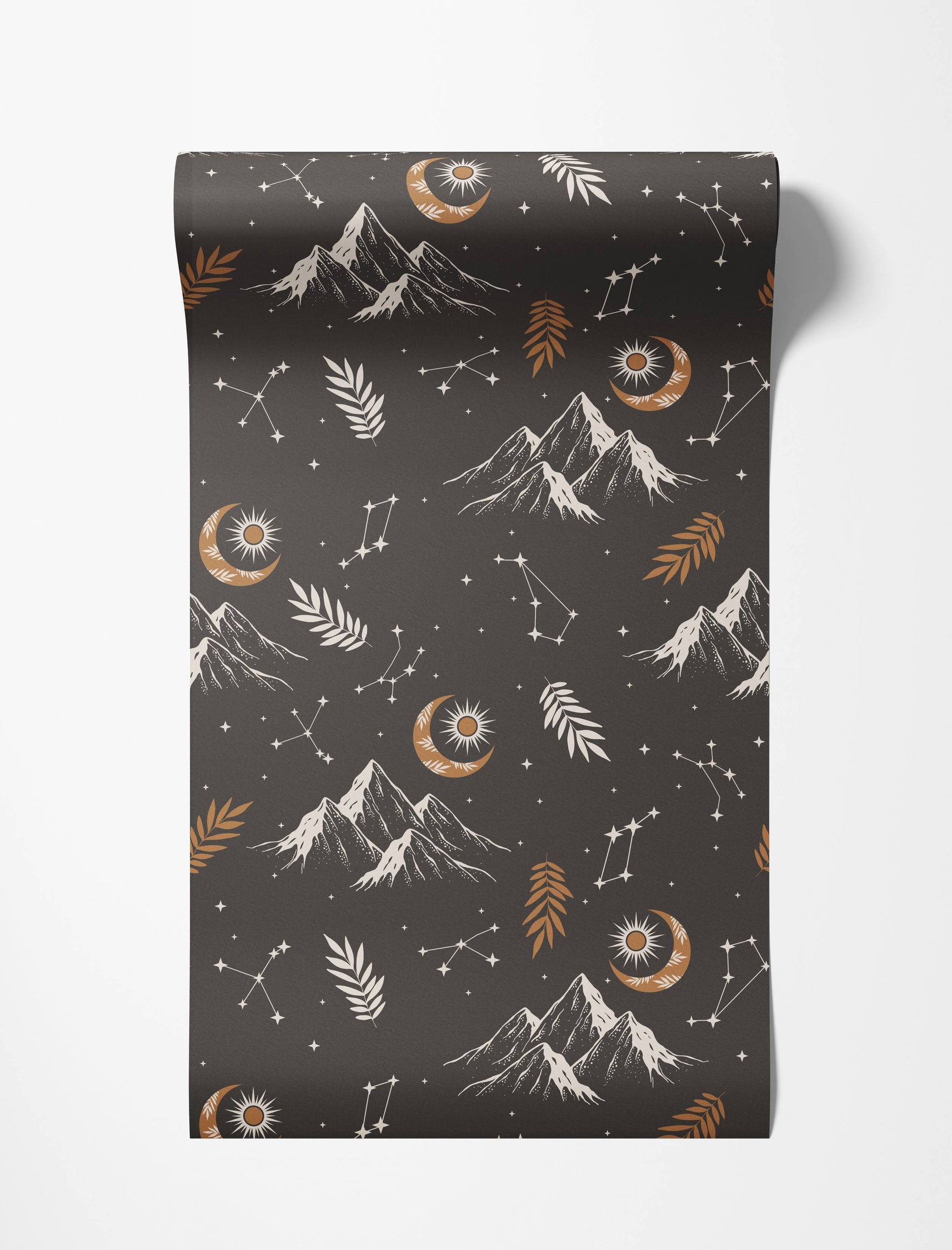 Celestial wallpaper with white mountains, gold crescent moons with suns, constellations, and leaves on a dark gray background.