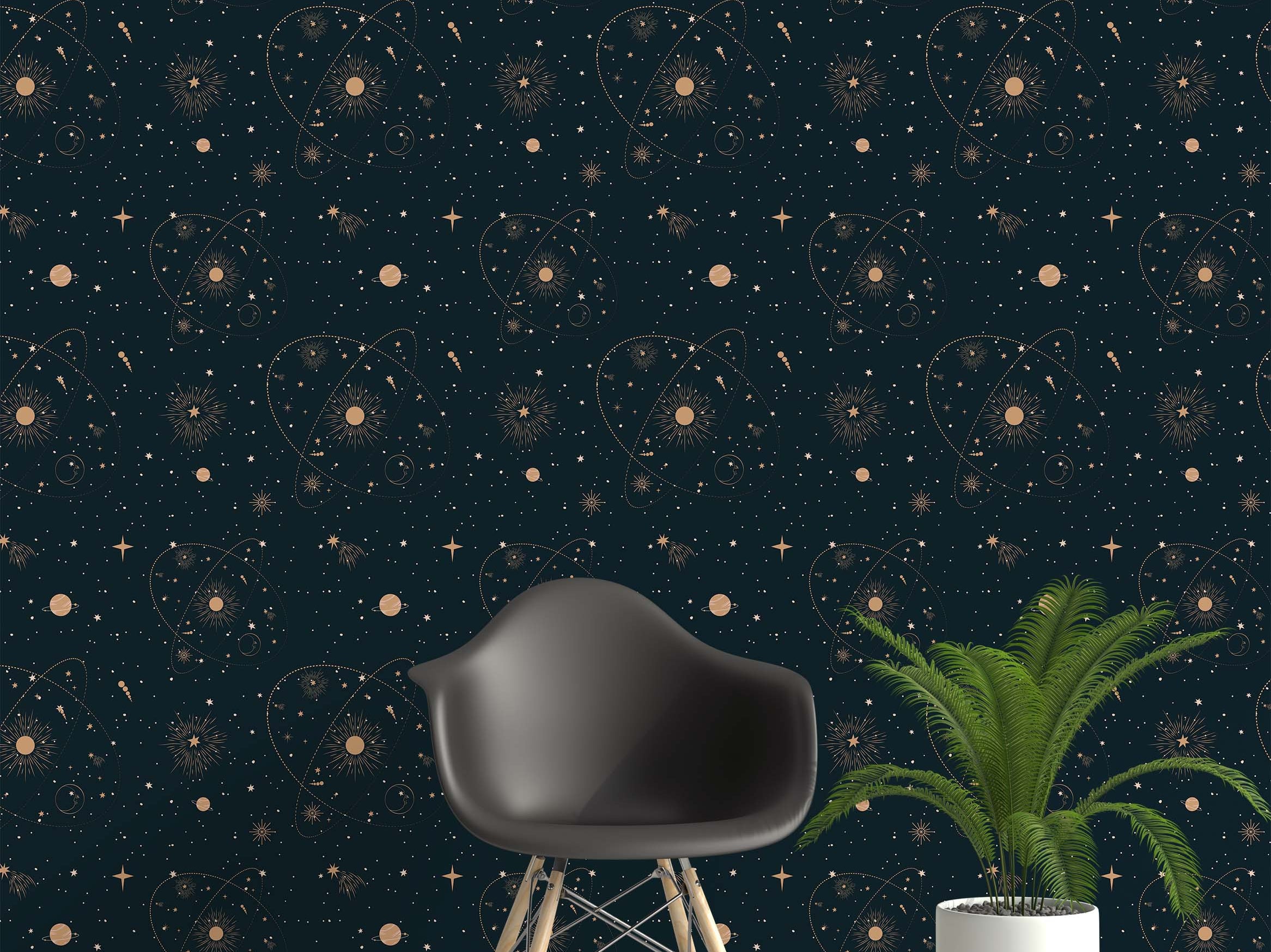 Dark teal wallpaper with a repeating pattern of golden celestial elements, including suns, various stars, planets, and orbits.