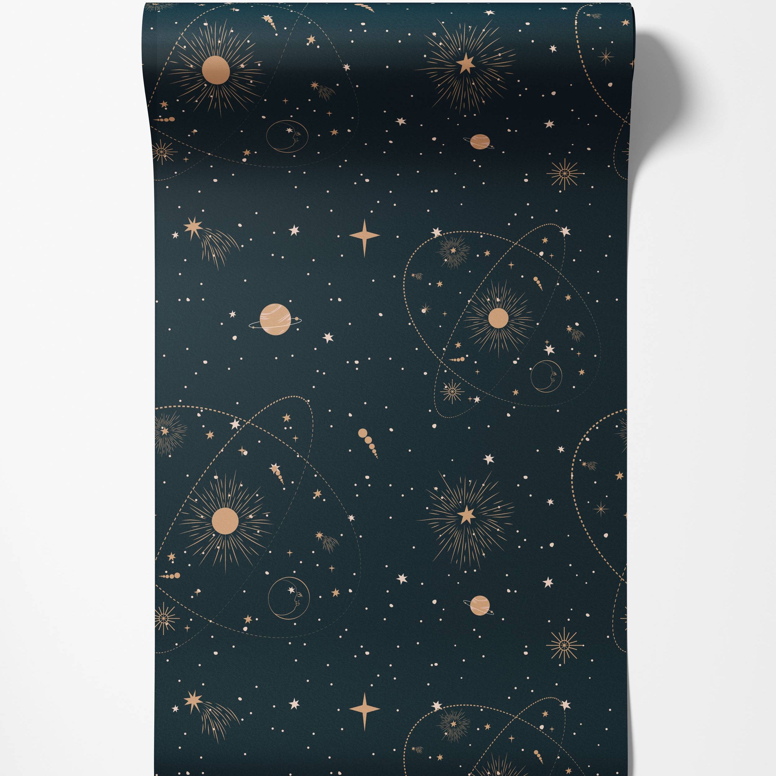 Dark blue wallpaper with a celestial pattern featuring gold stars, planets, sunbursts, and orbital lines.