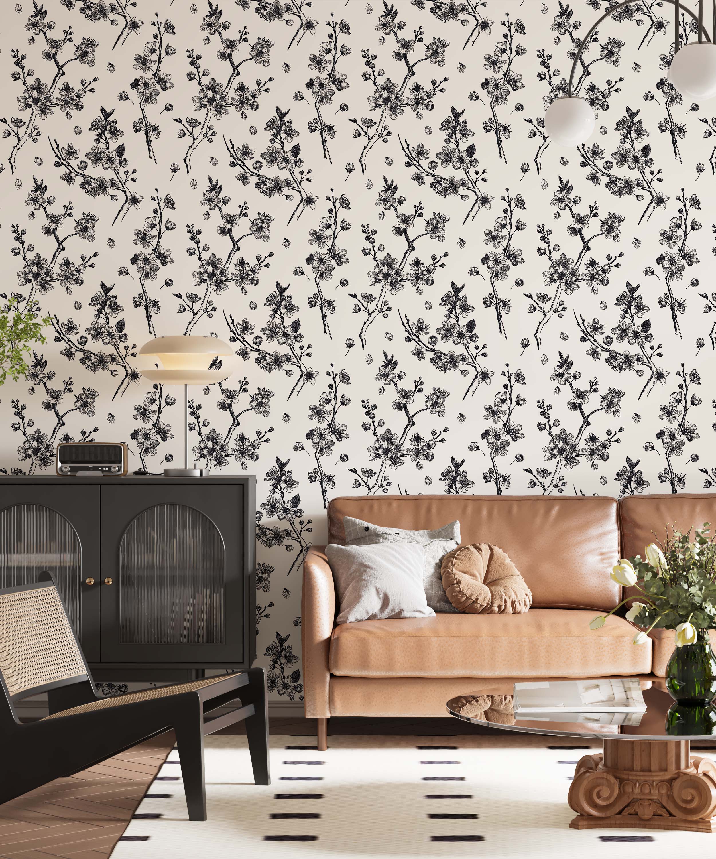 Wallpaper featuring black sketch-style cherry blossom branches and petals scattered across a cream background.