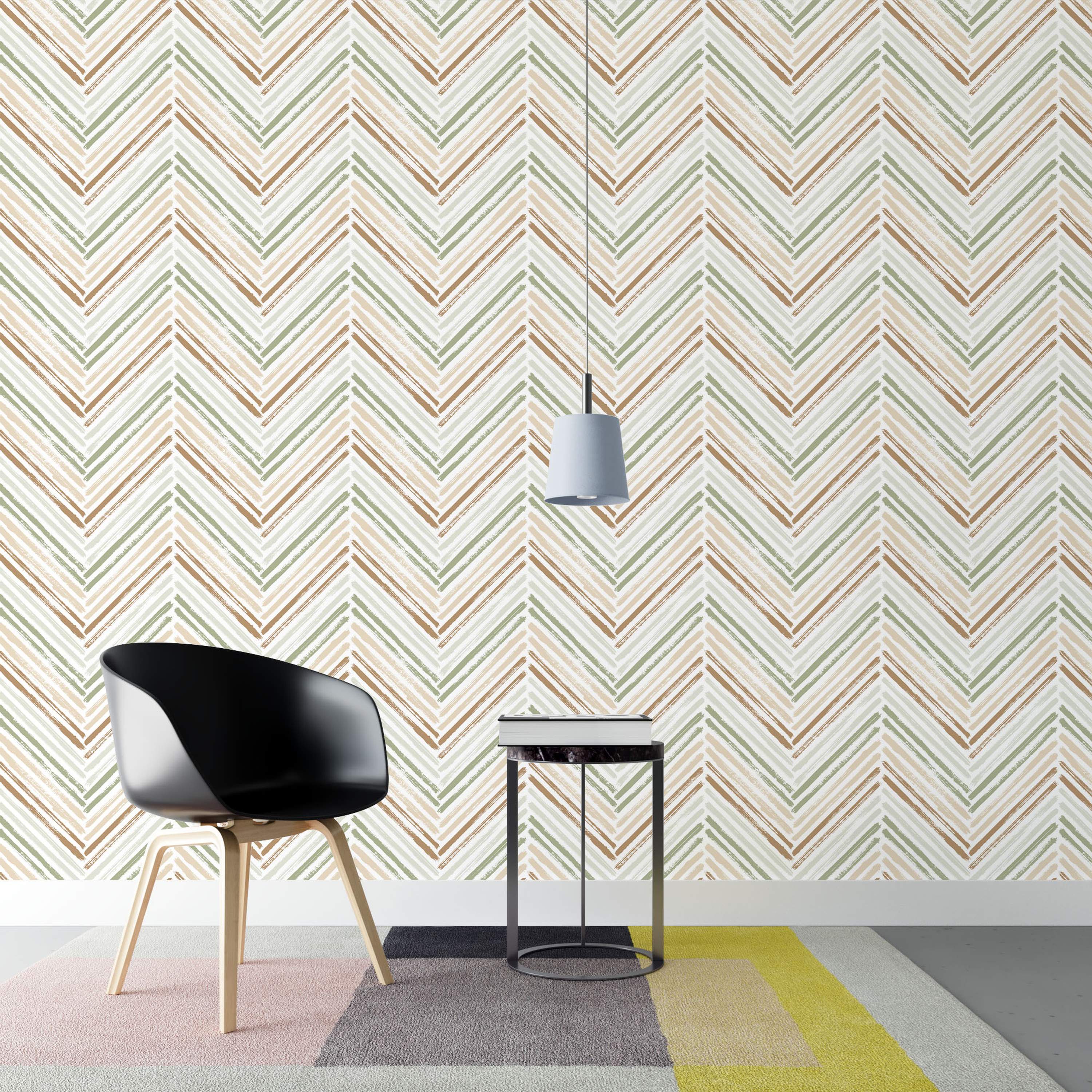 Wallpaper featuring a chevron pattern composed of brushstroke lines in green, brown, beige, and light gray on a white background.