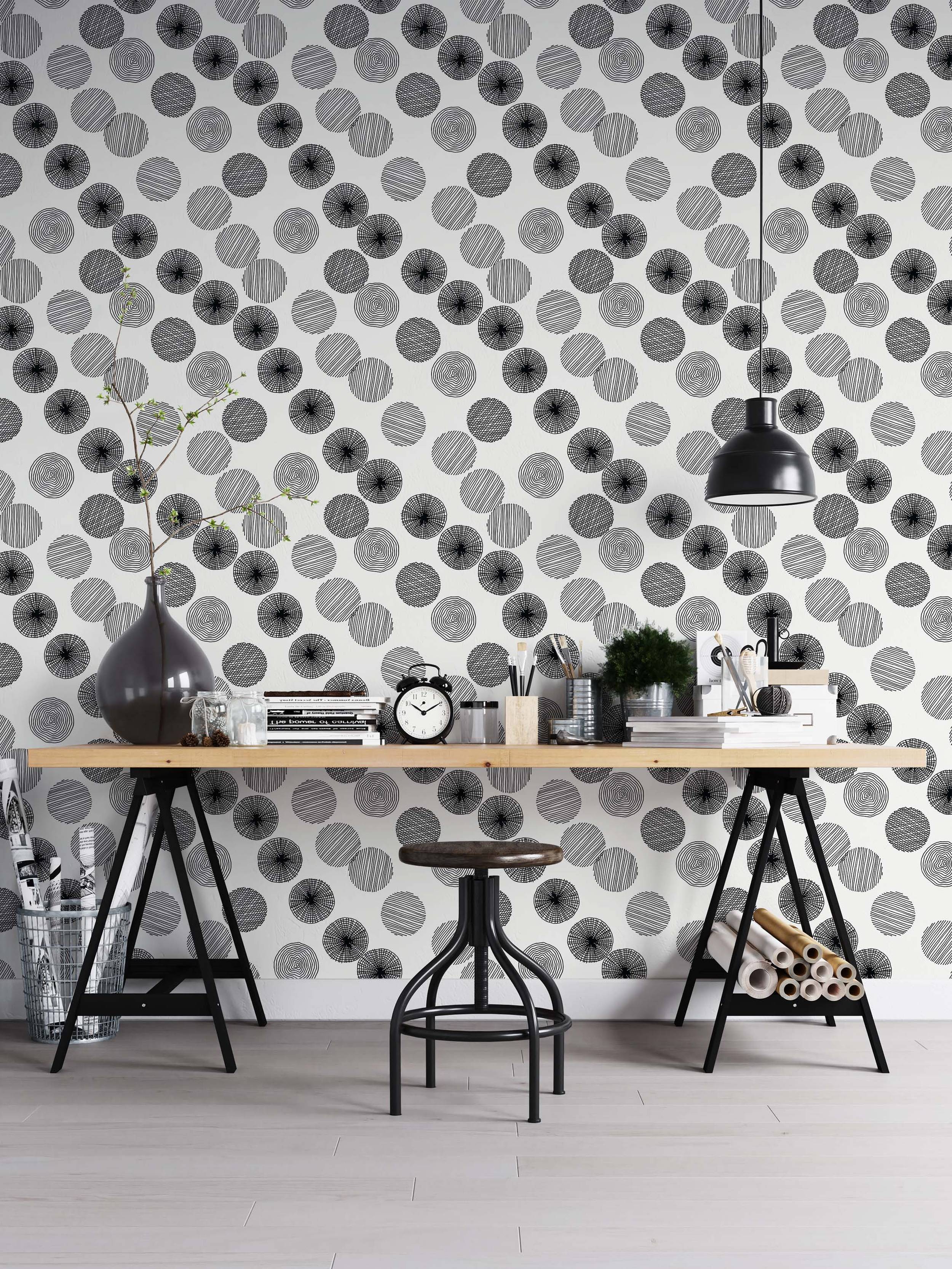 Wallpaper featuring black hand-drawn style circles with varied internal line patterns scattered across a white background.