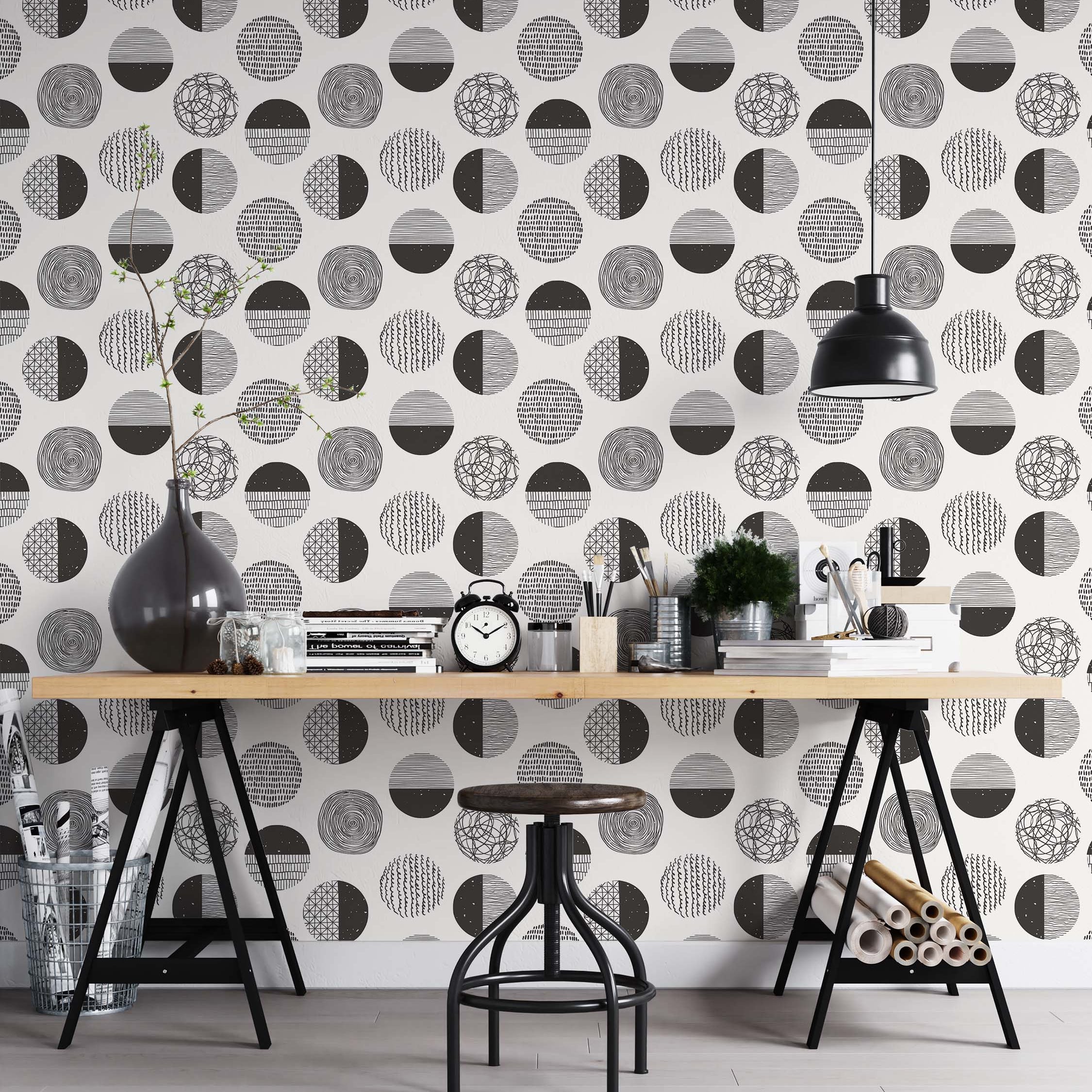 Black and white wallpaper with a repeating pattern of circles, each filled with different hand-drawn textures like lines and scribbles.