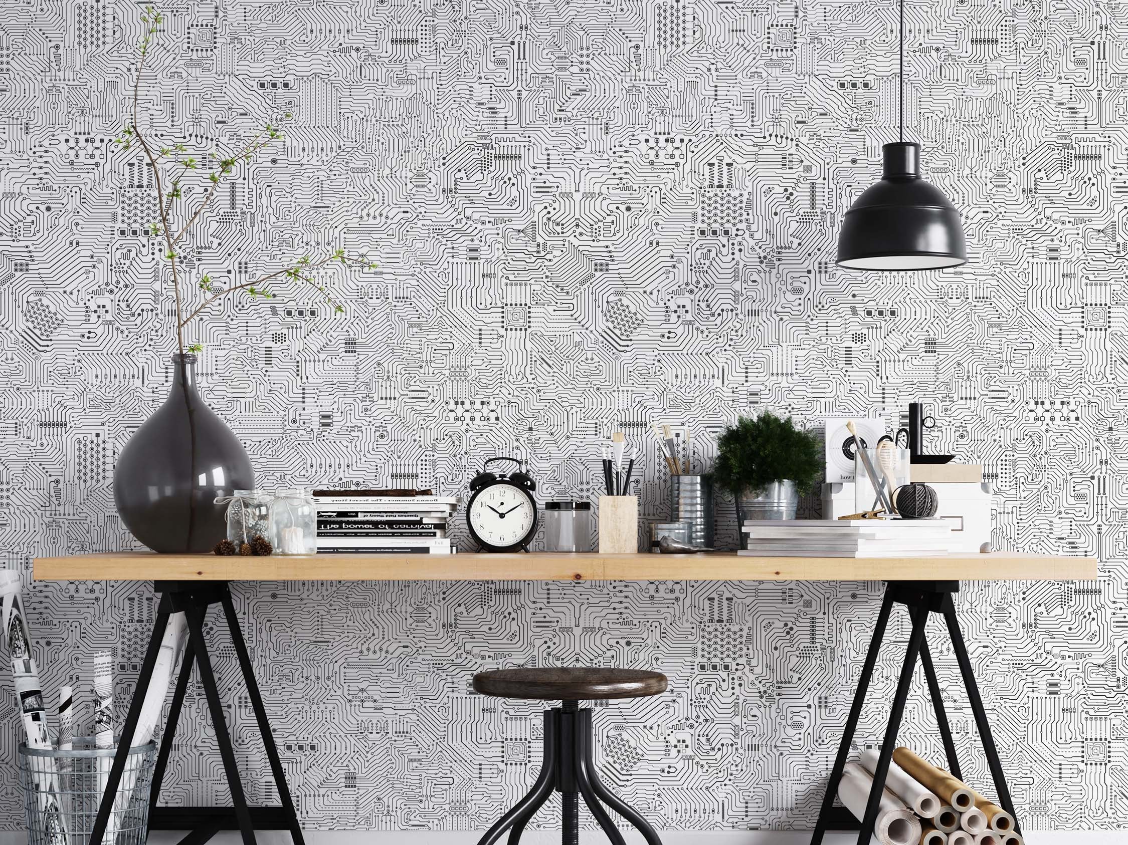 Black and white wallpaper featuring a detailed, intricate circuit board pattern with fine lines and various electronic components.