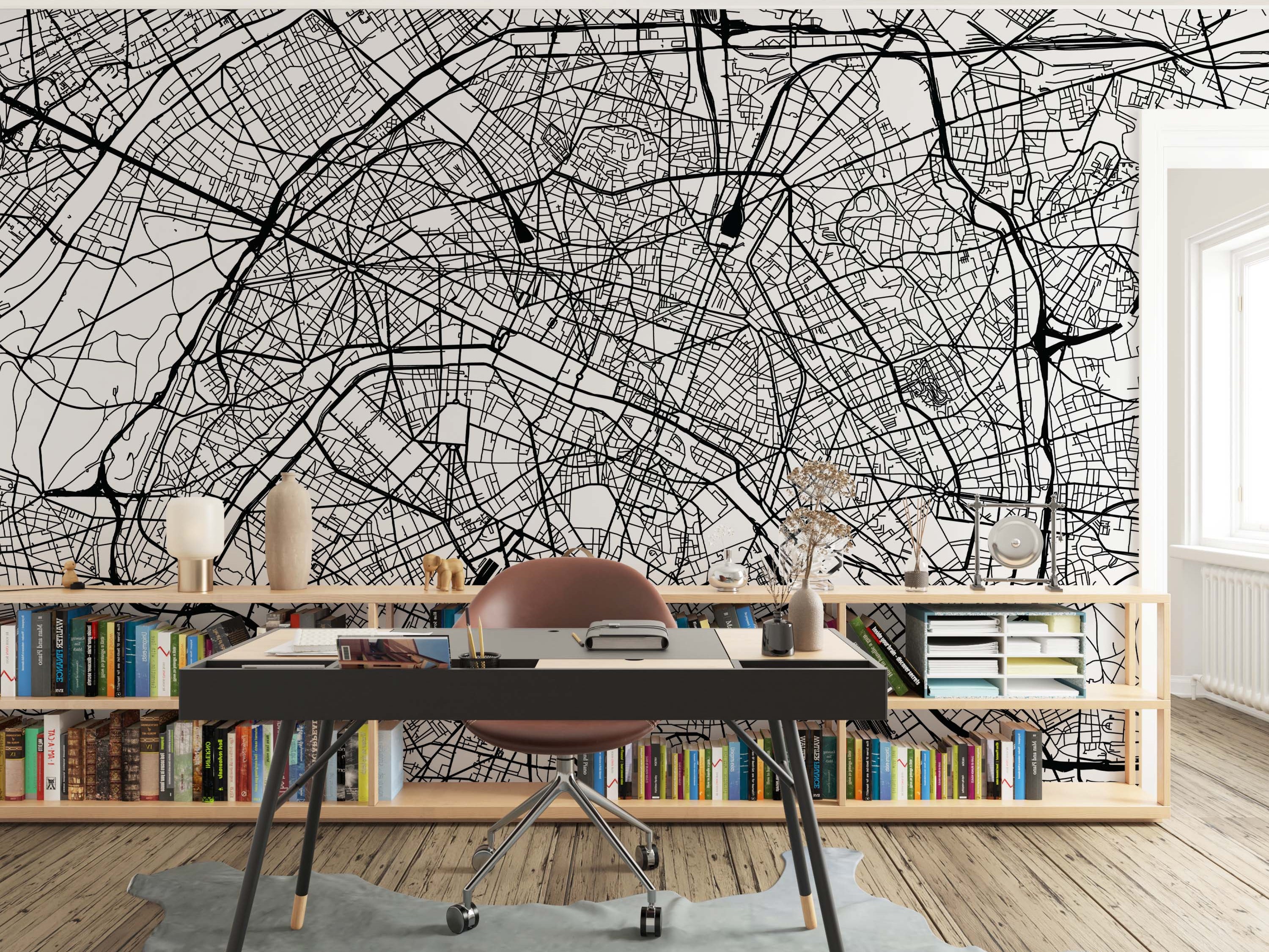 Black and white mural showcasing a complex city street map design with intricate roadways.