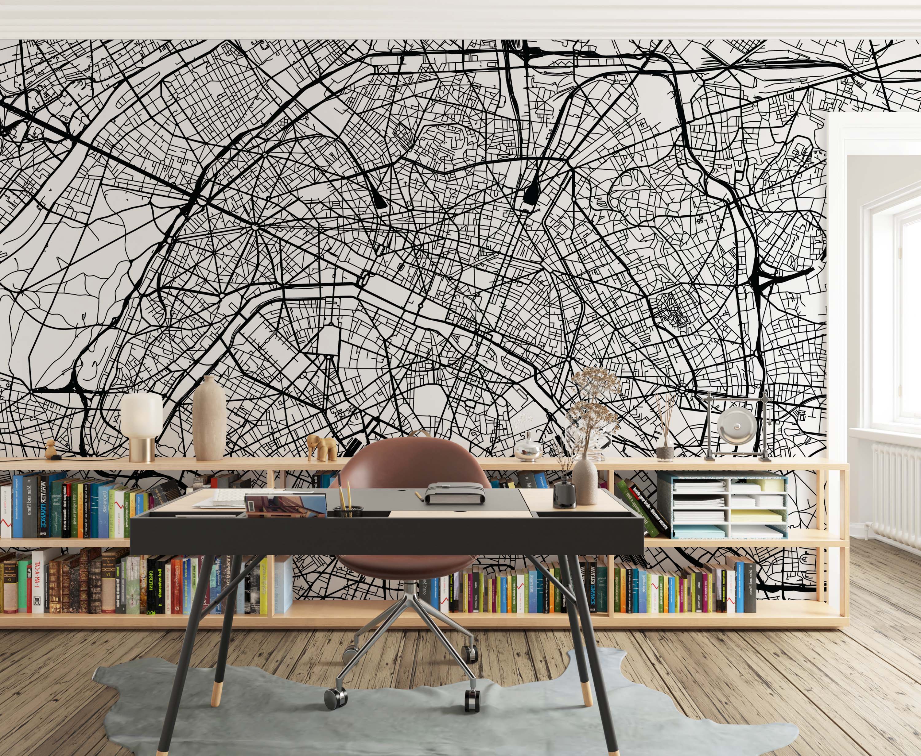Black and white mural showcasing a complex city street map design with intricate roadways.