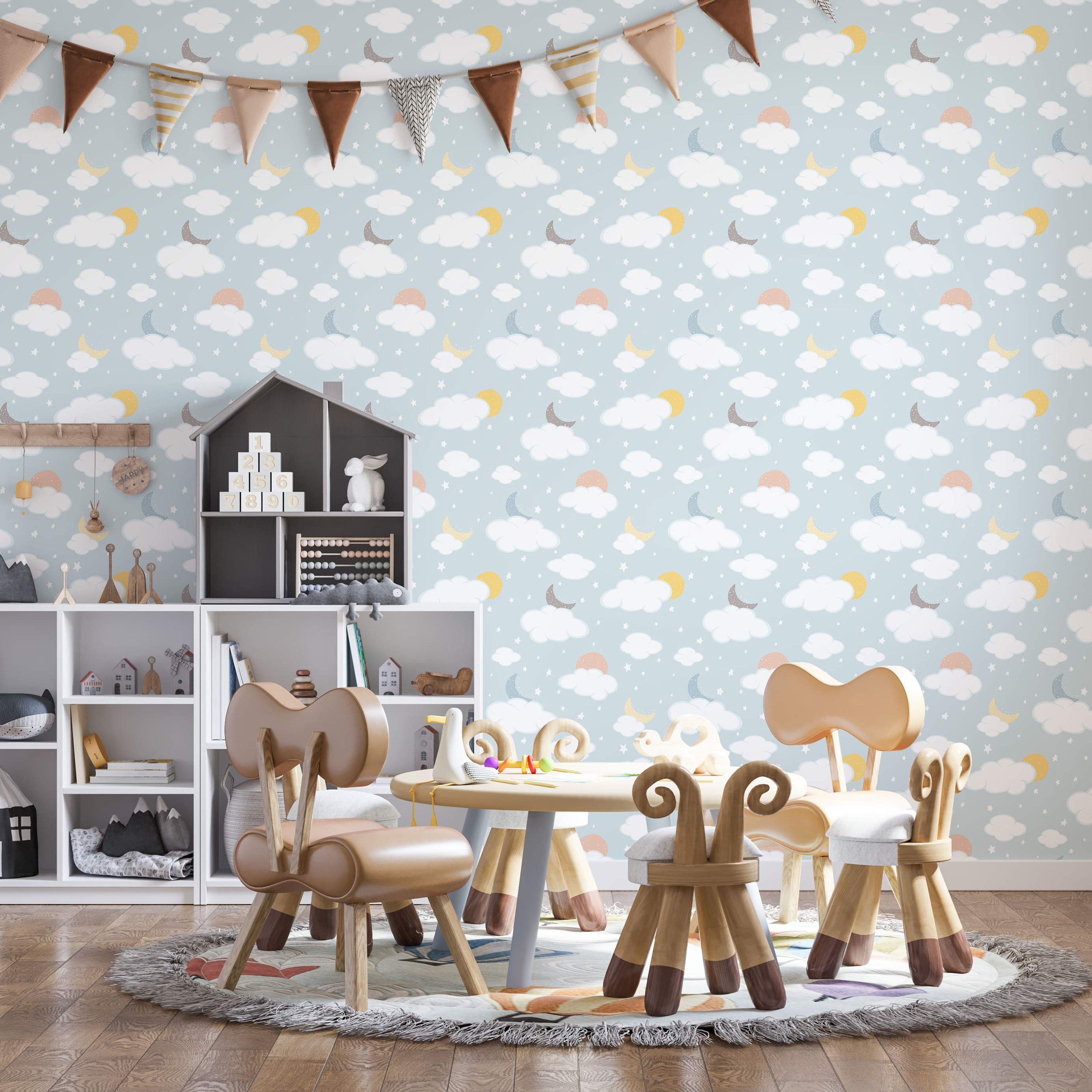 Whimsical wallpaper with illustrated white clouds, yellow suns, gray moons, and tiny stars on a pale blue background.