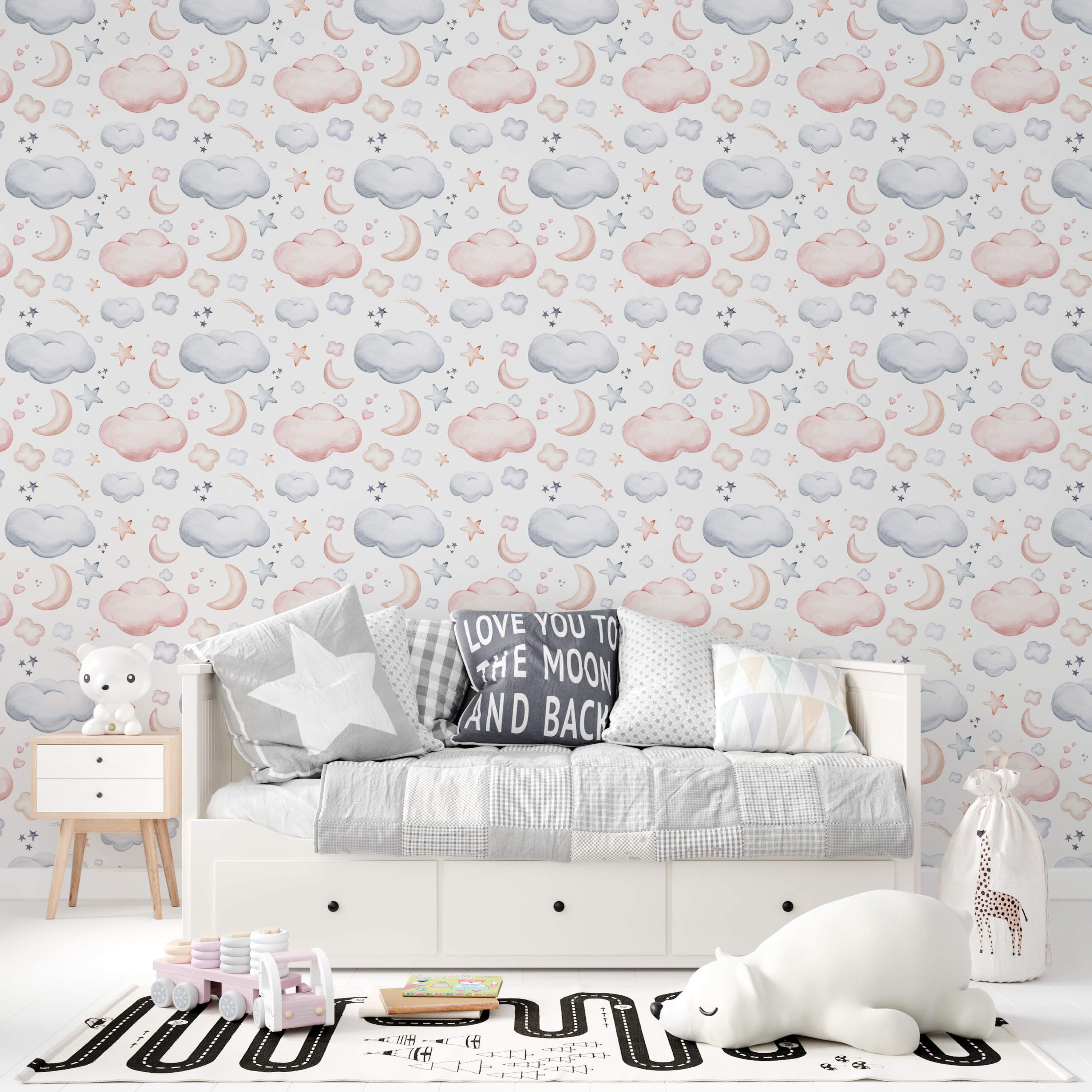 Watercolor wallpaper featuring repeating soft pink and blue-grey clouds, beige crescent moons, and stars on a white background.