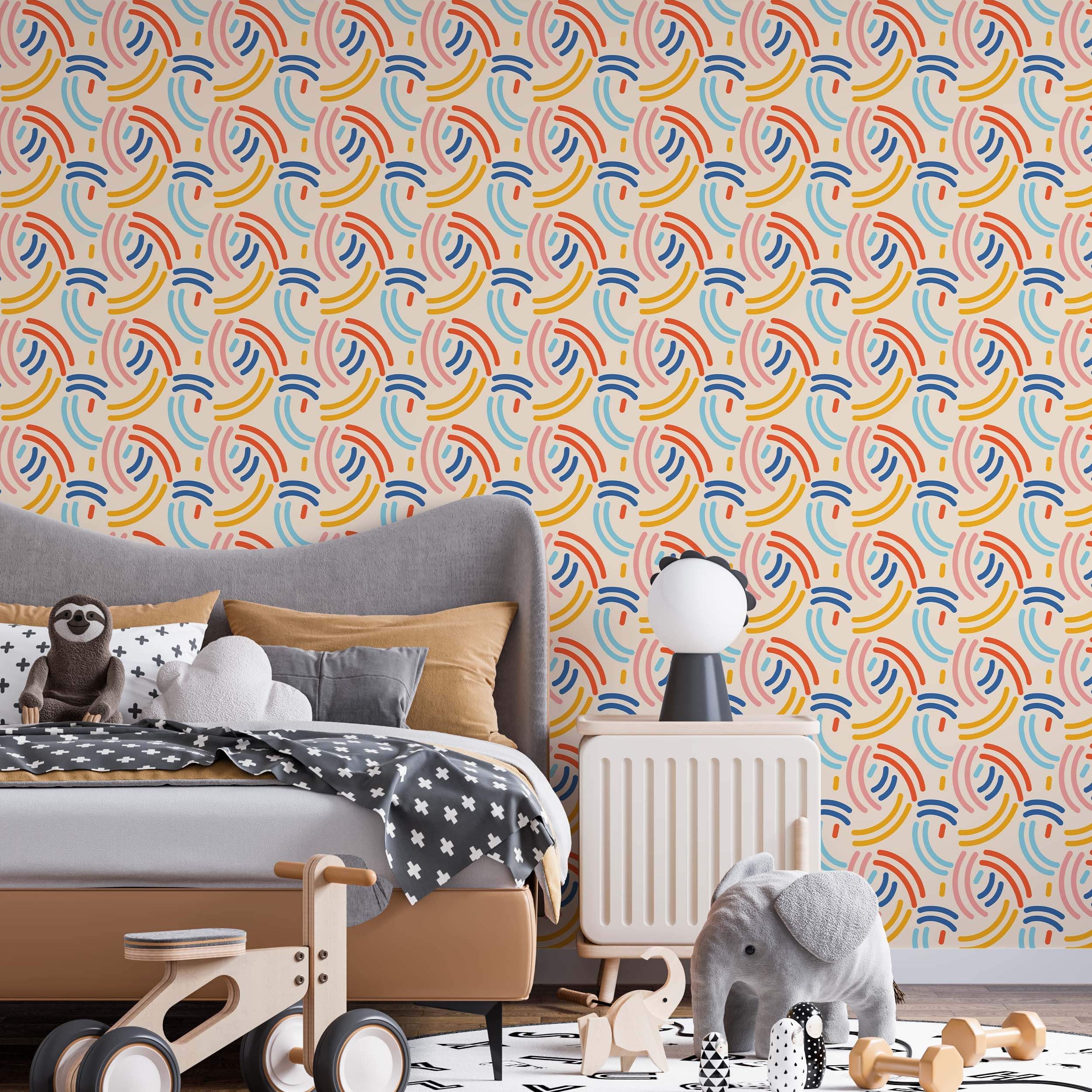 Playful wallpaper design with abstract arrangements of red, blue, yellow, and pink arcs on a light beige field.