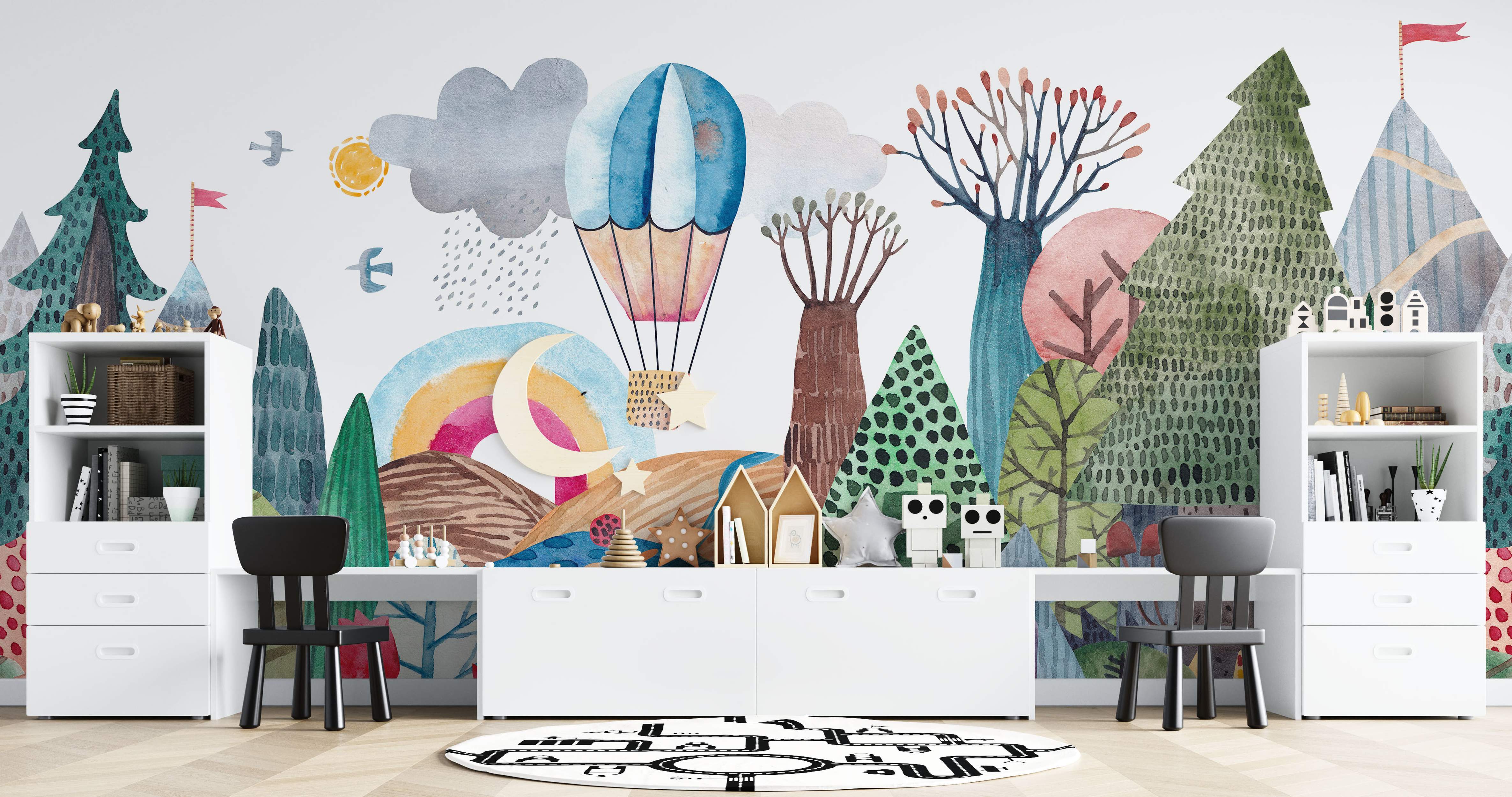 Colorful forest and hot air balloon mural with trees and sky.