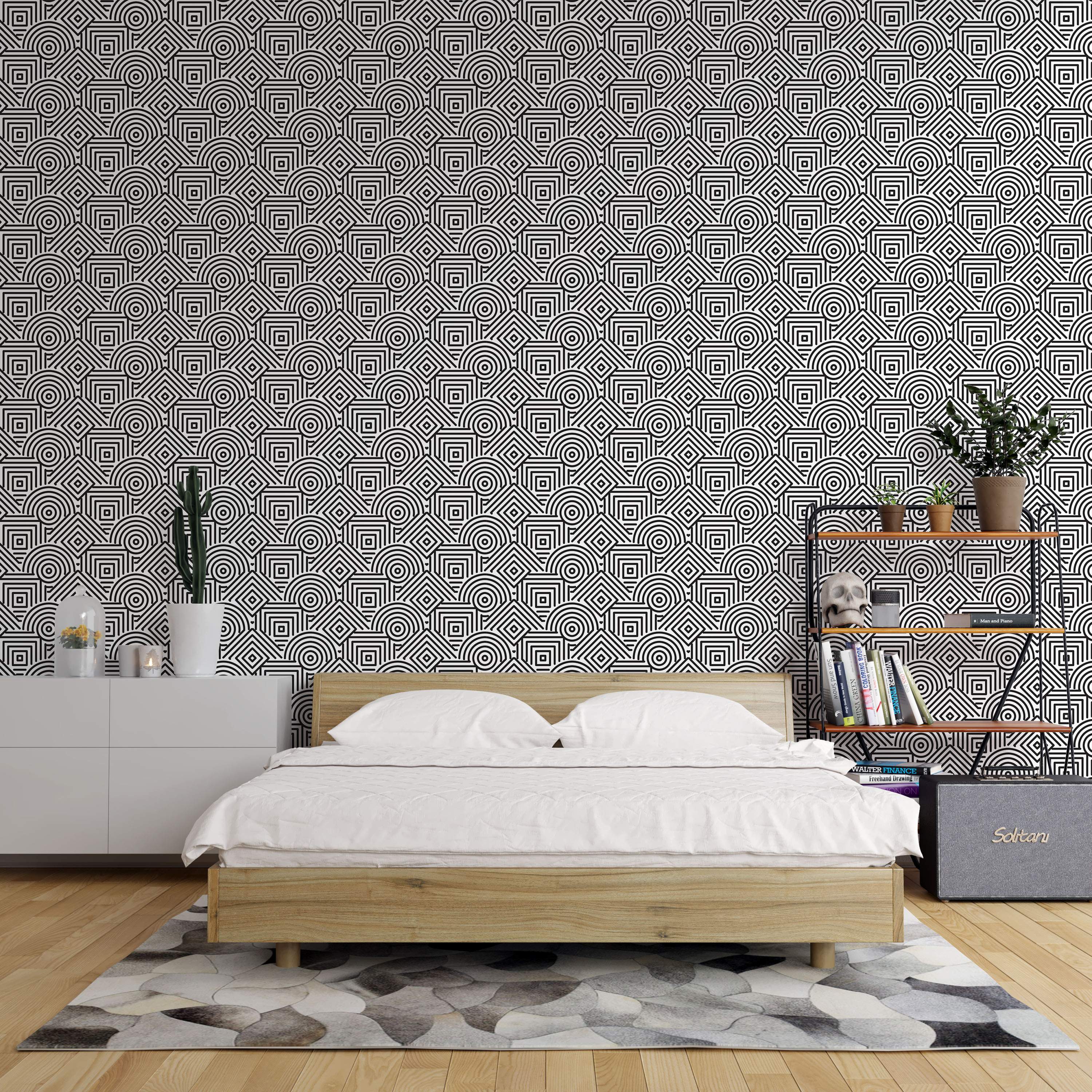 Black and white geometric wallpaper featuring repeating concentric squares, diamonds, and curved line segments.