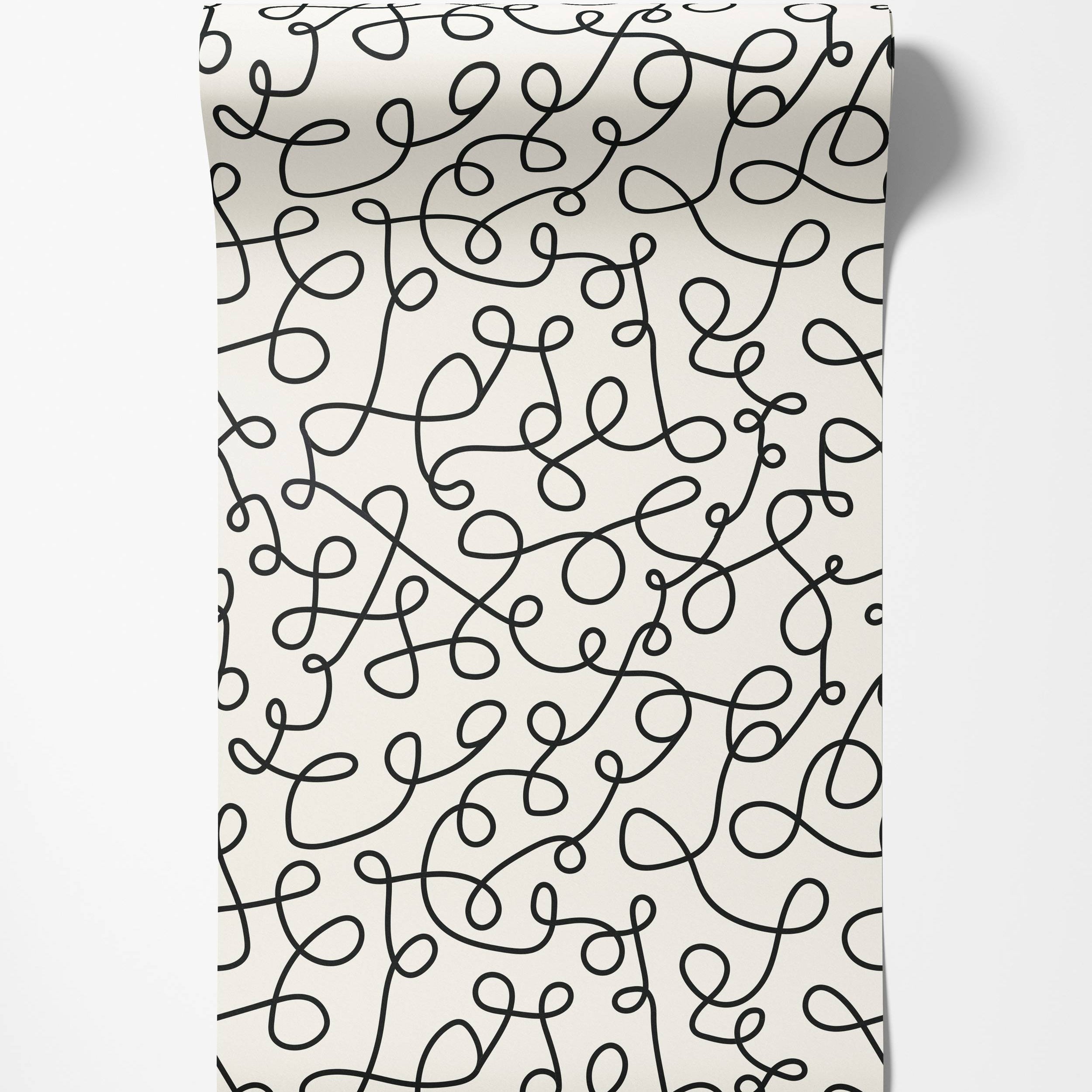 Wallpaper with an abstract pattern of continuous black looping lines creating a playful scribble effect on an off-white background.