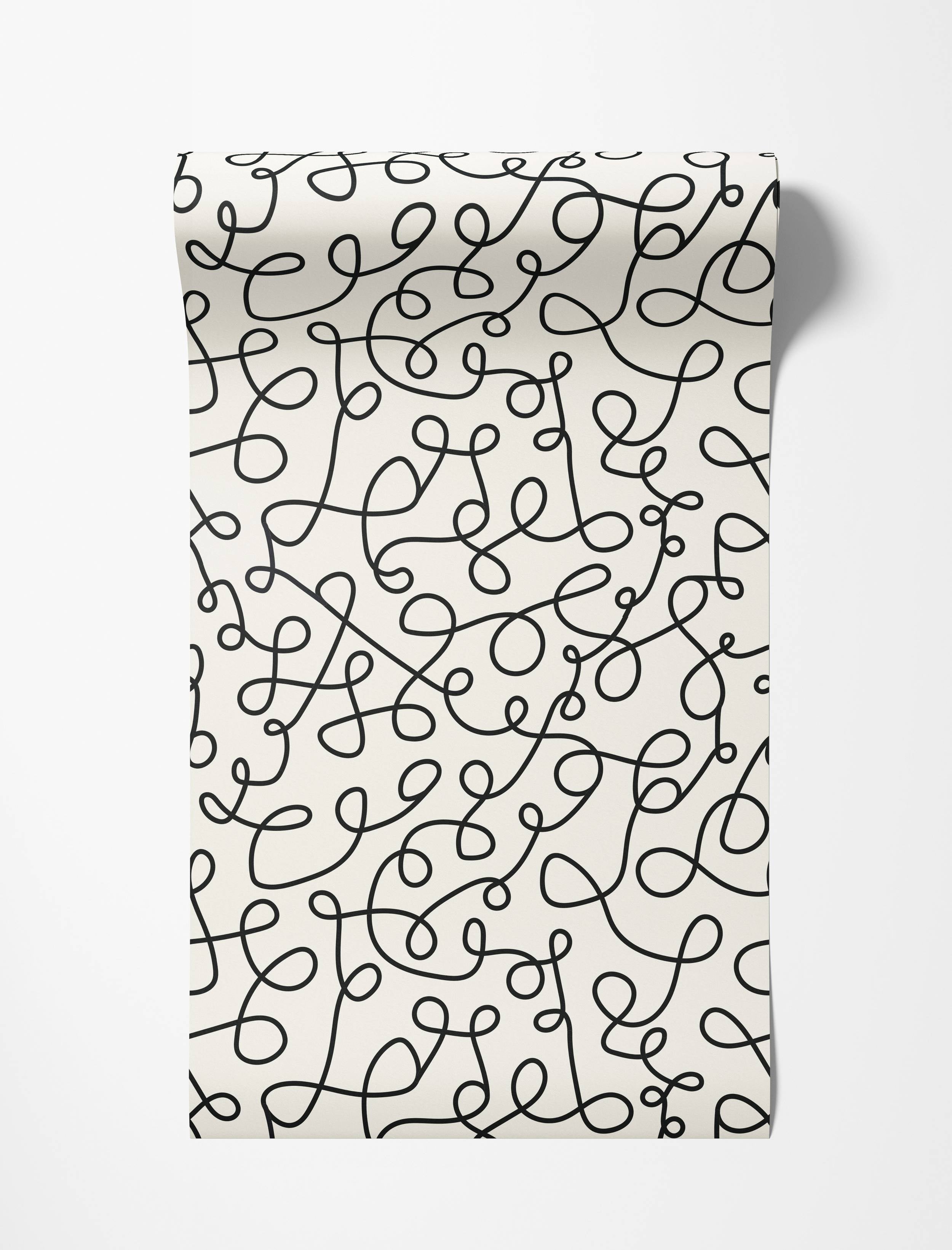 Wallpaper with an abstract pattern of continuous black looping lines creating a playful scribble effect on an off-white background.